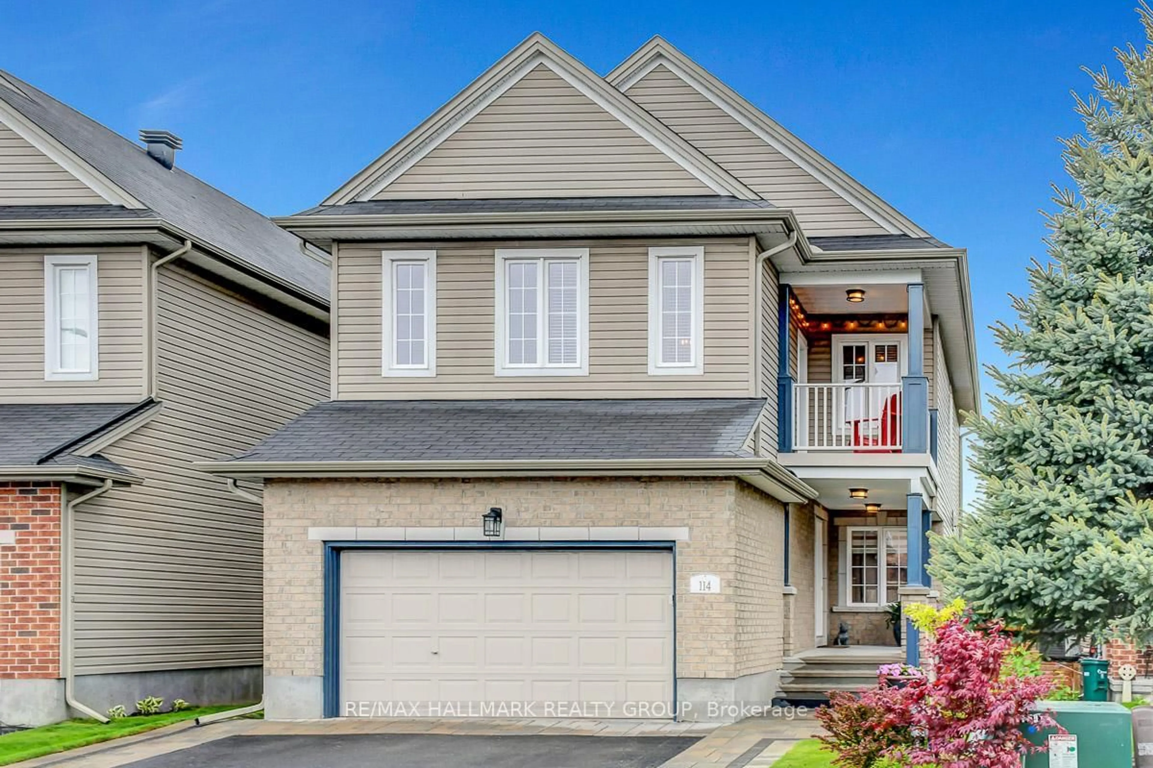Home with vinyl exterior material, street for 114 August Lily Cres, Ottawa Ontario K1V 2A6