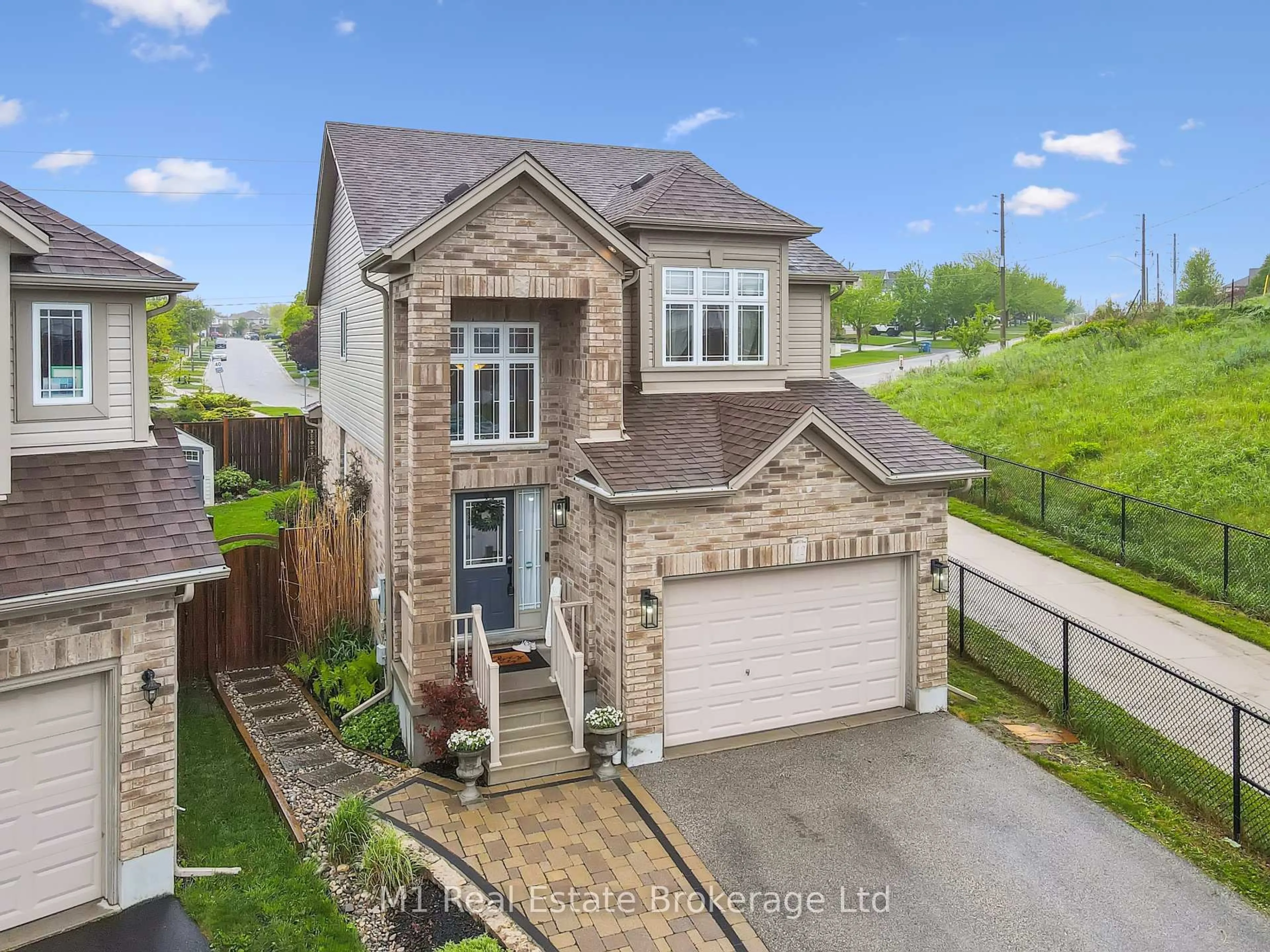 A pic from outside/outdoor area/front of a property/back of a property/a pic from drone, street for 12 Oakes Crt, Guelph Ontario N1E 0J6