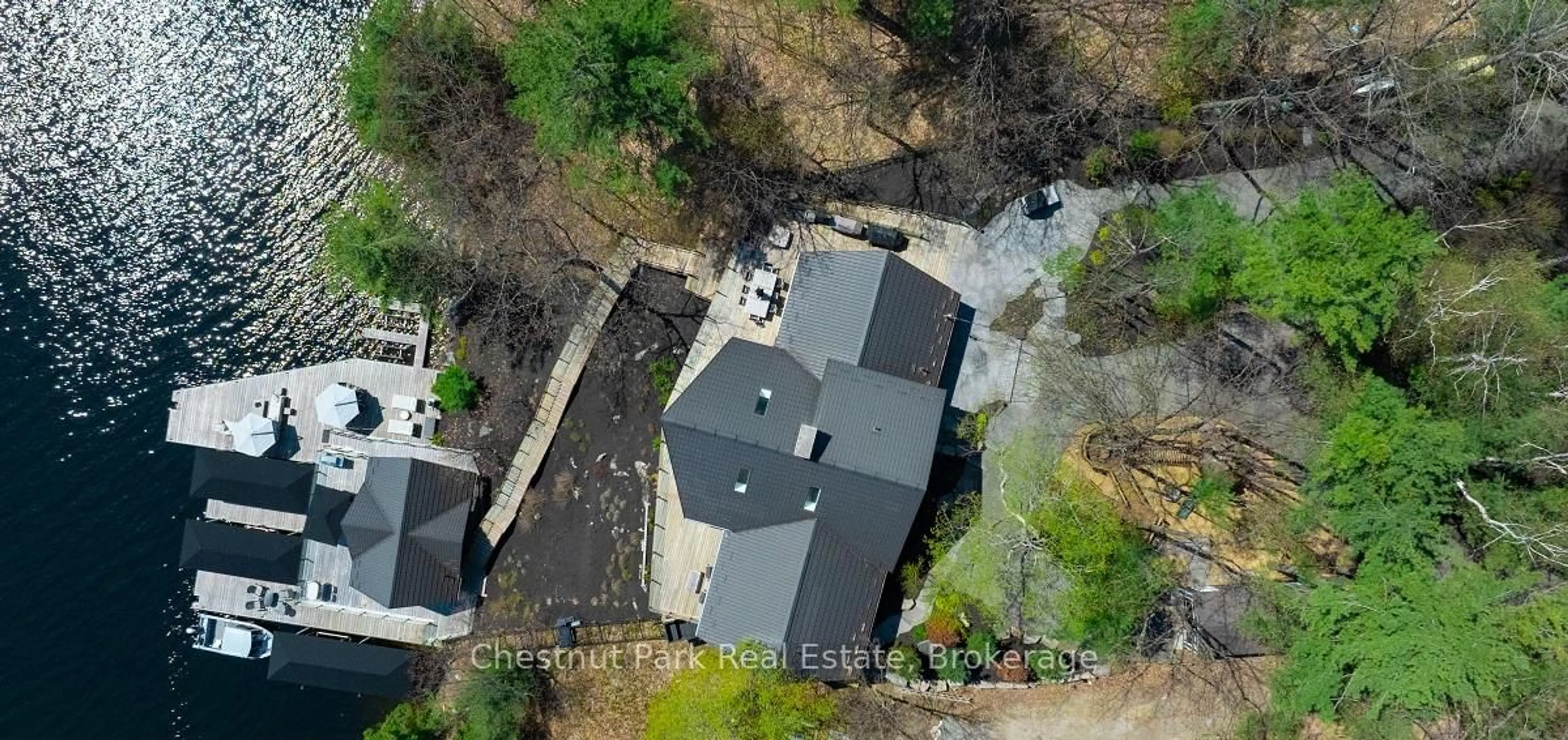 A pic from outside/outdoor area/front of a property/back of a property/a pic from drone, street for 1007 Sagamo Blvd, Muskoka Lakes Ontario P0B 1J0