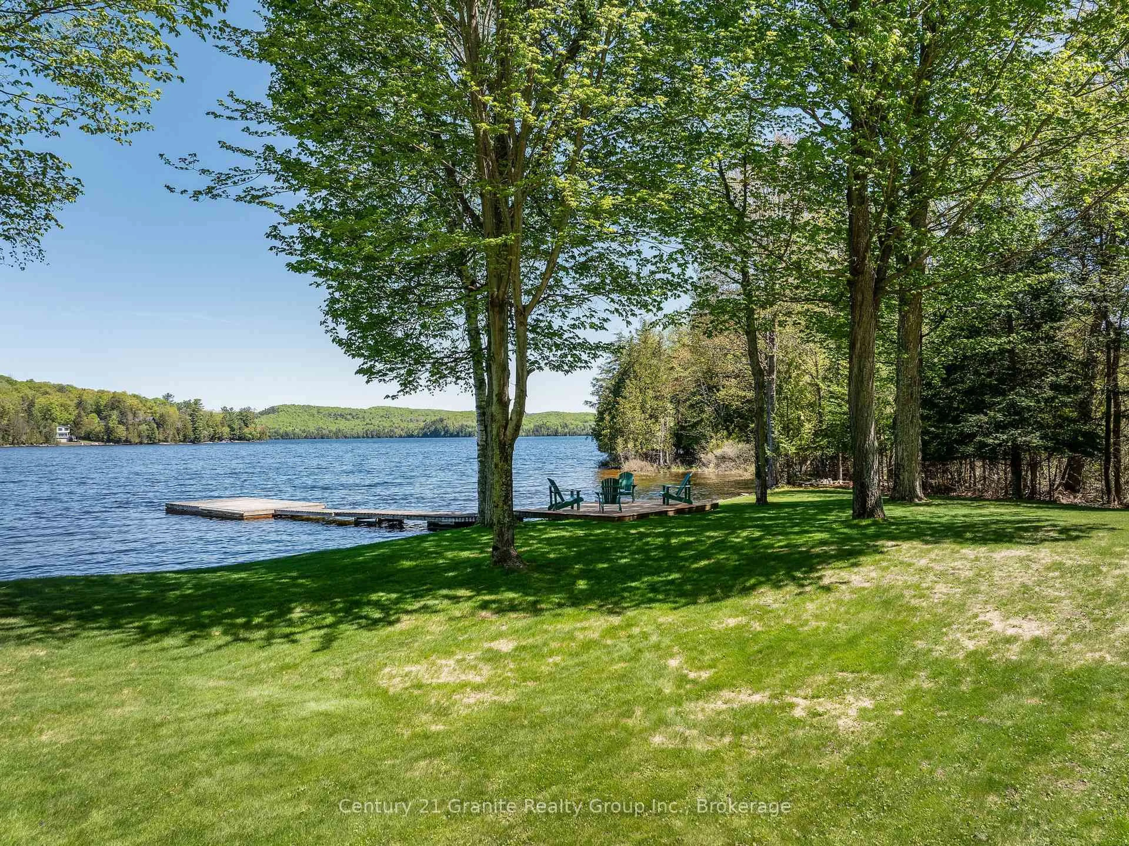 A pic from outside/outdoor area/front of a property/back of a property/a pic from drone, water/lake/river/ocean view for 1192 Elk Dr, Dysart et al Ontario K0M 1S0