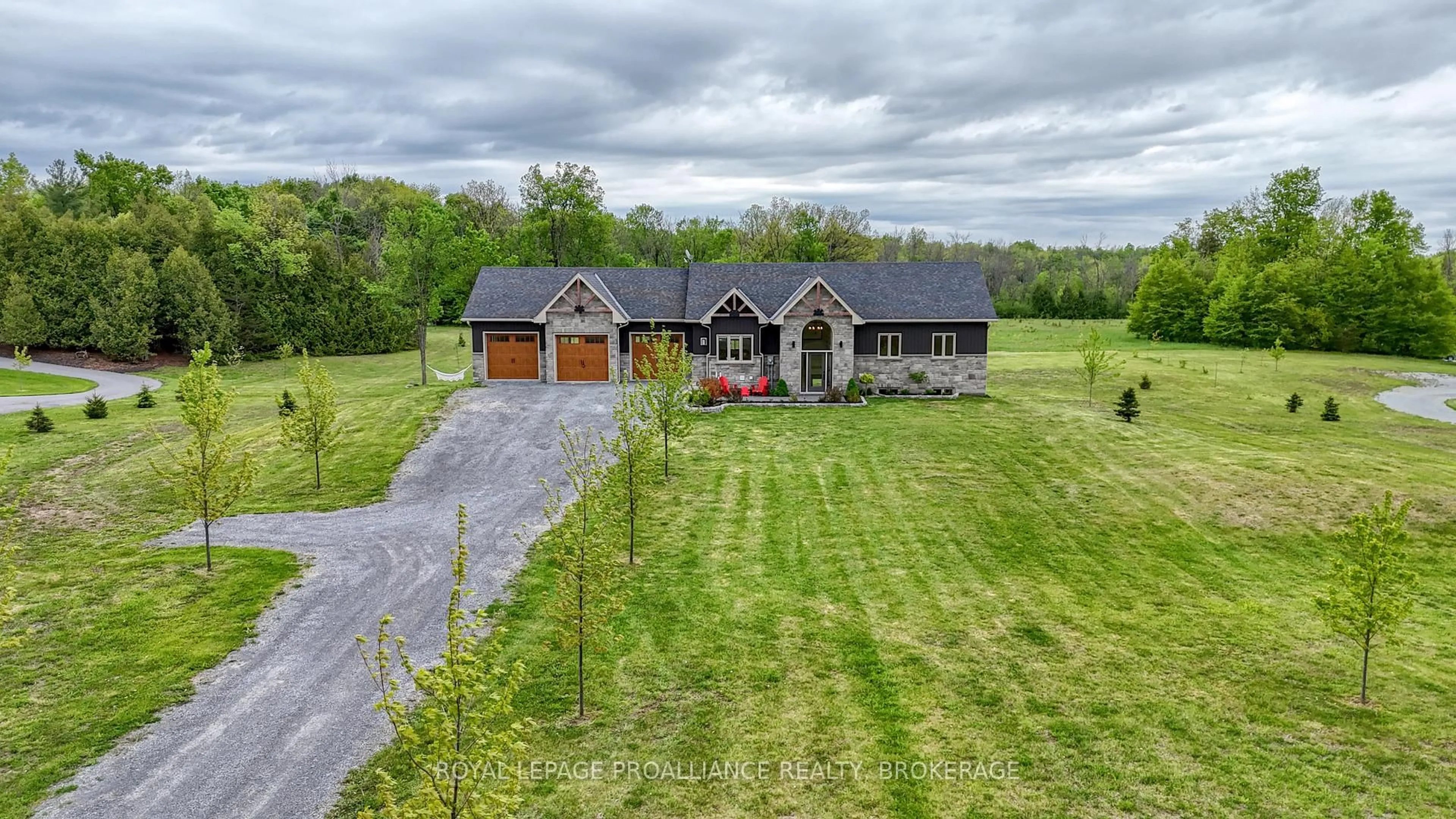 A pic from outside/outdoor area/front of a property/back of a property/a pic from drone, unknown for 3794 Jamieson Rd, Harrowsmith Ontario K0H 1V0