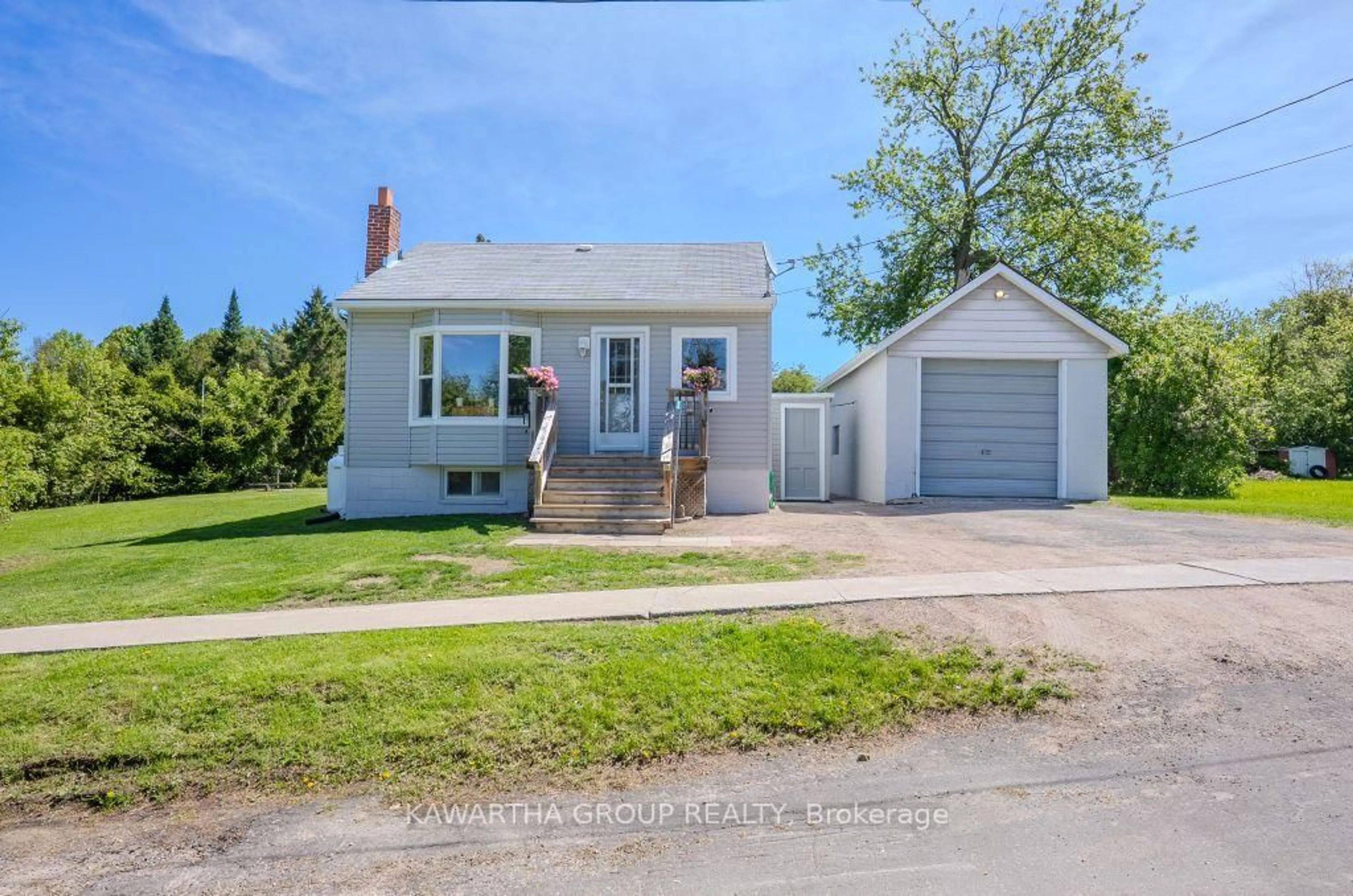 A pic from outside/outdoor area/front of a property/back of a property/a pic from drone, street for 26 Elizabeth St, Kawartha Lakes Ontario K0M 1K0