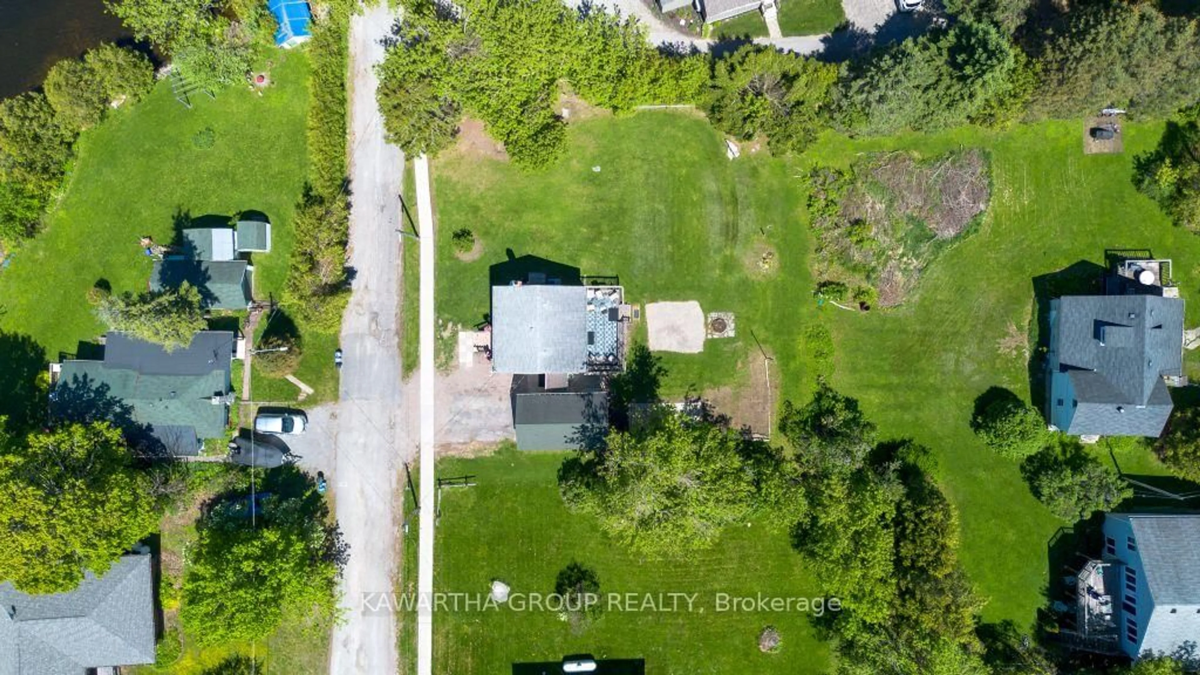 A pic from outside/outdoor area/front of a property/back of a property/a pic from drone, water/lake/river/ocean view for 26 Elizabeth St, Kawartha Lakes Ontario K0M 1K0
