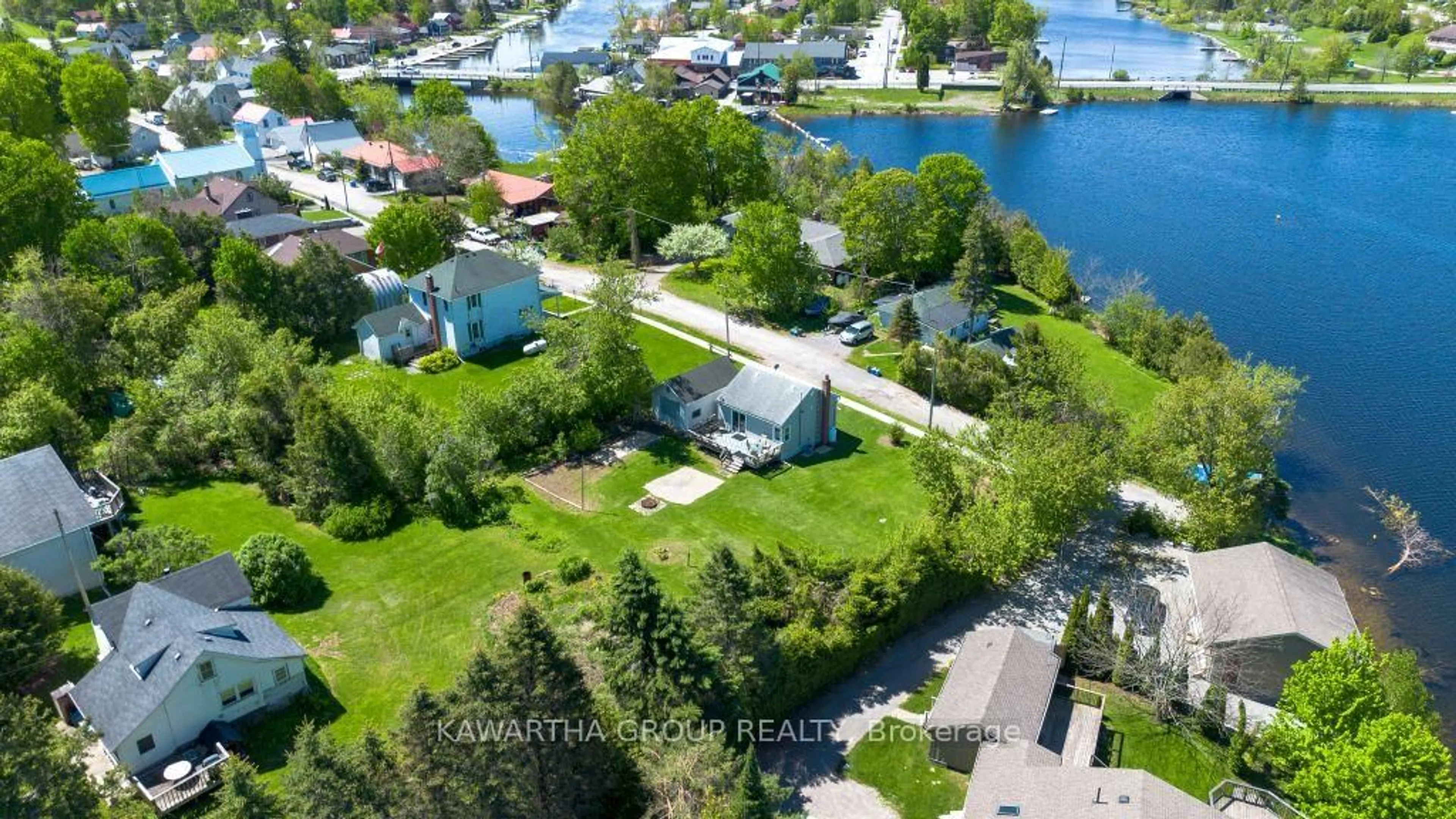 A pic from outside/outdoor area/front of a property/back of a property/a pic from drone, water/lake/river/ocean view for 26 Elizabeth St, Kawartha Lakes Ontario K0M 1K0