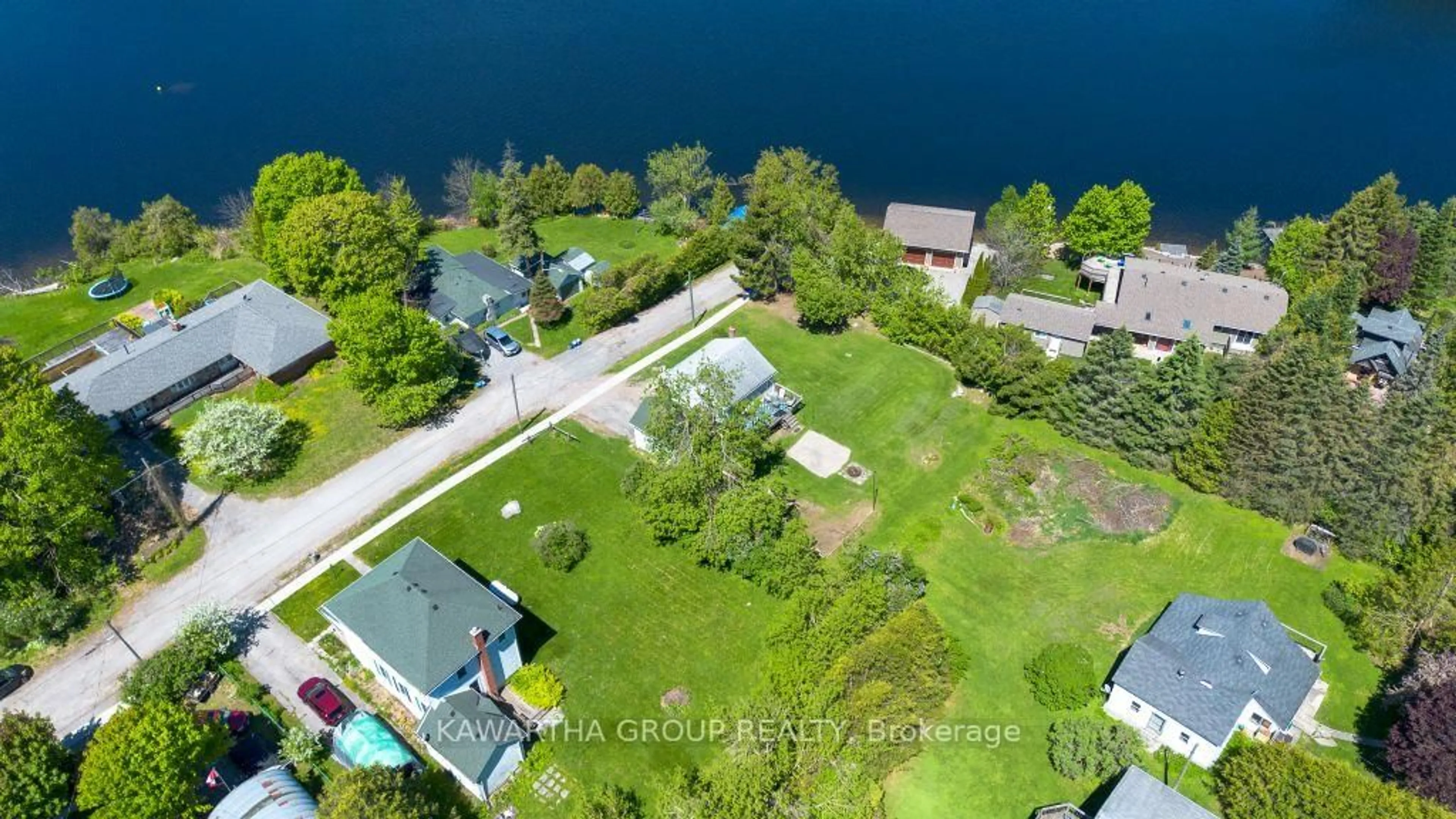A pic from outside/outdoor area/front of a property/back of a property/a pic from drone, water/lake/river/ocean view for 26 Elizabeth St, Kawartha Lakes Ontario K0M 1K0