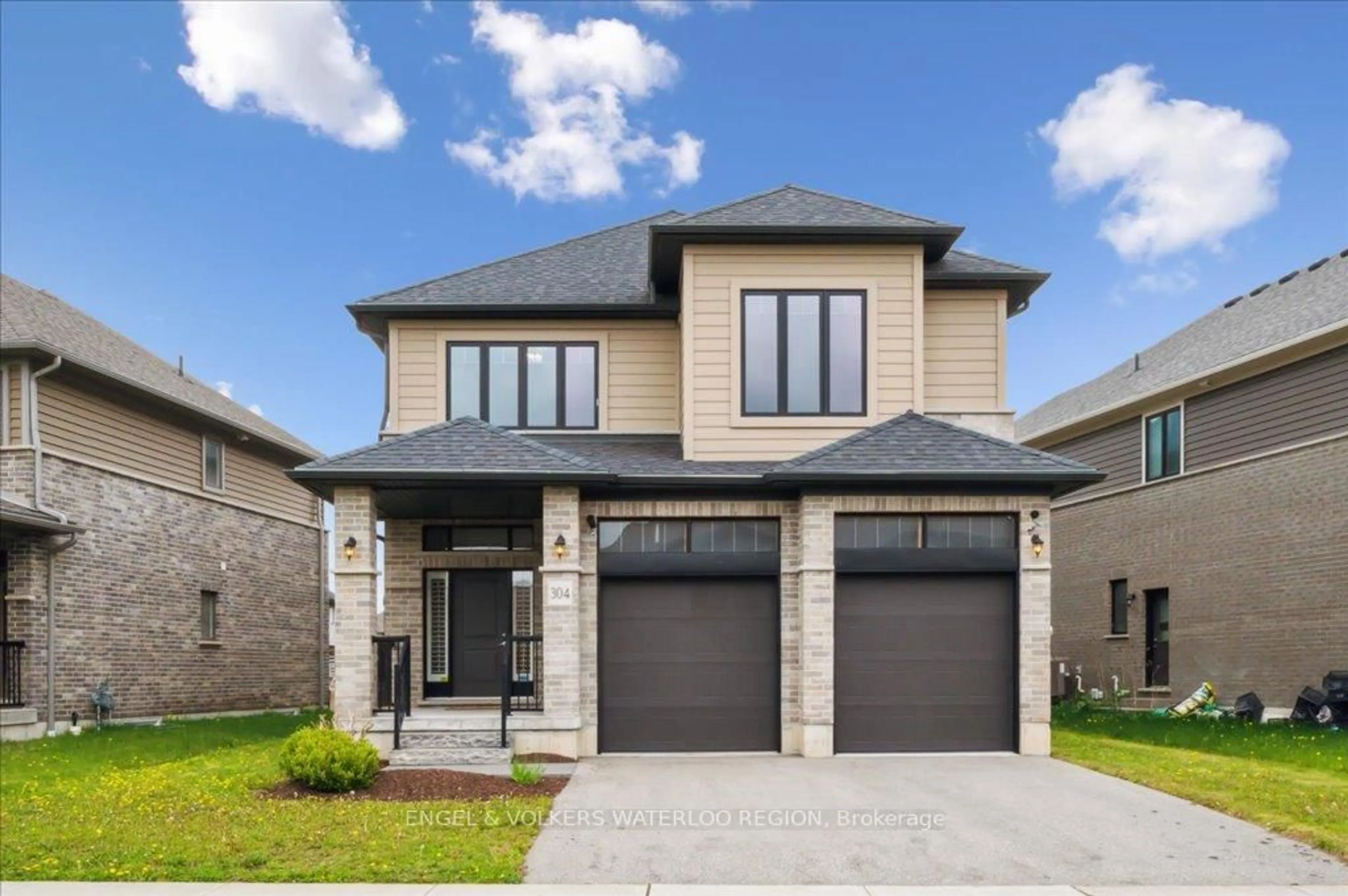 Home with brick exterior material, street for 304 Carriage Way, Waterloo Ontario N2K 0C2