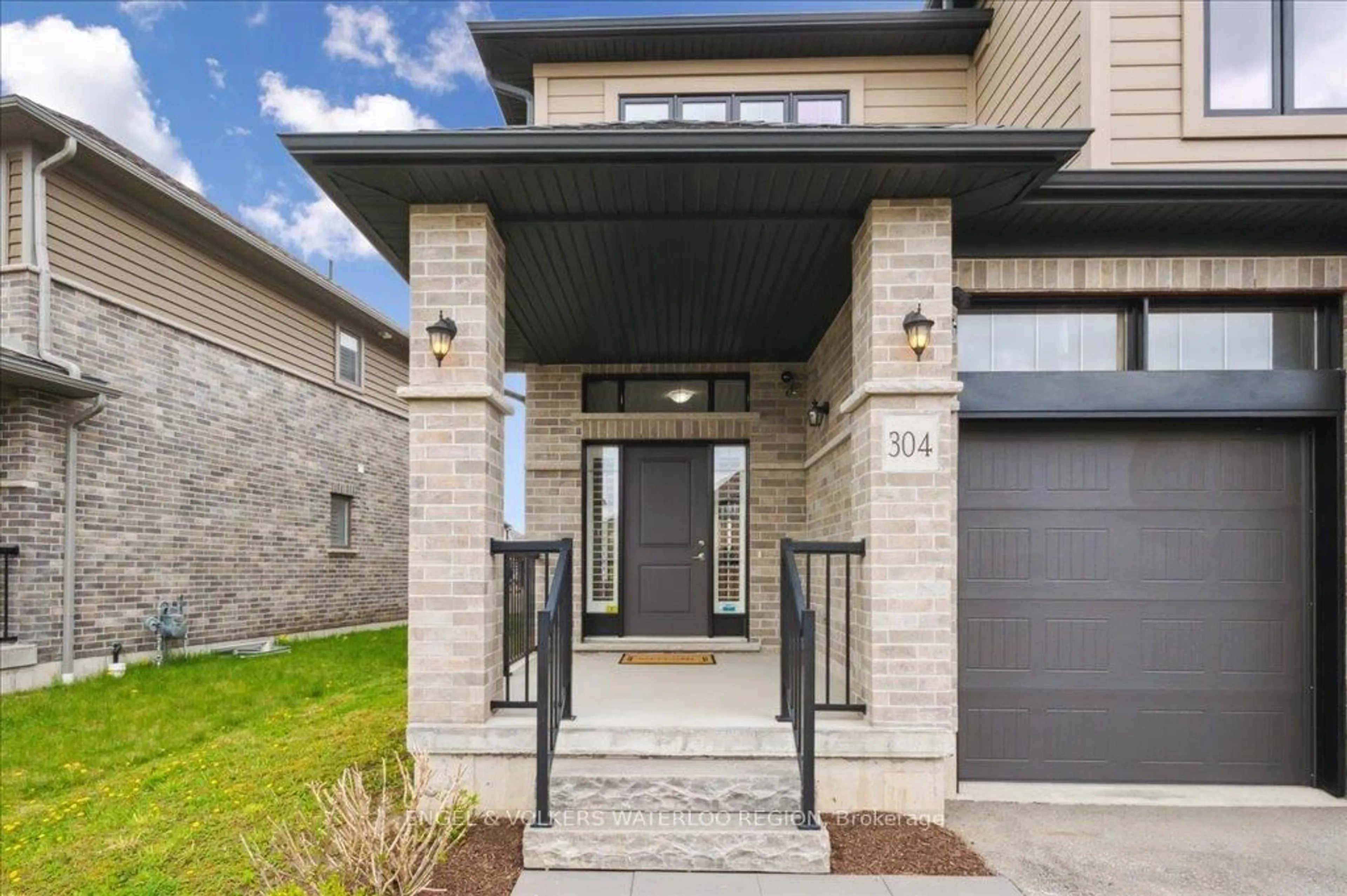 Home with brick exterior material, street for 304 Carriage Way, Waterloo Ontario N2K 0C2