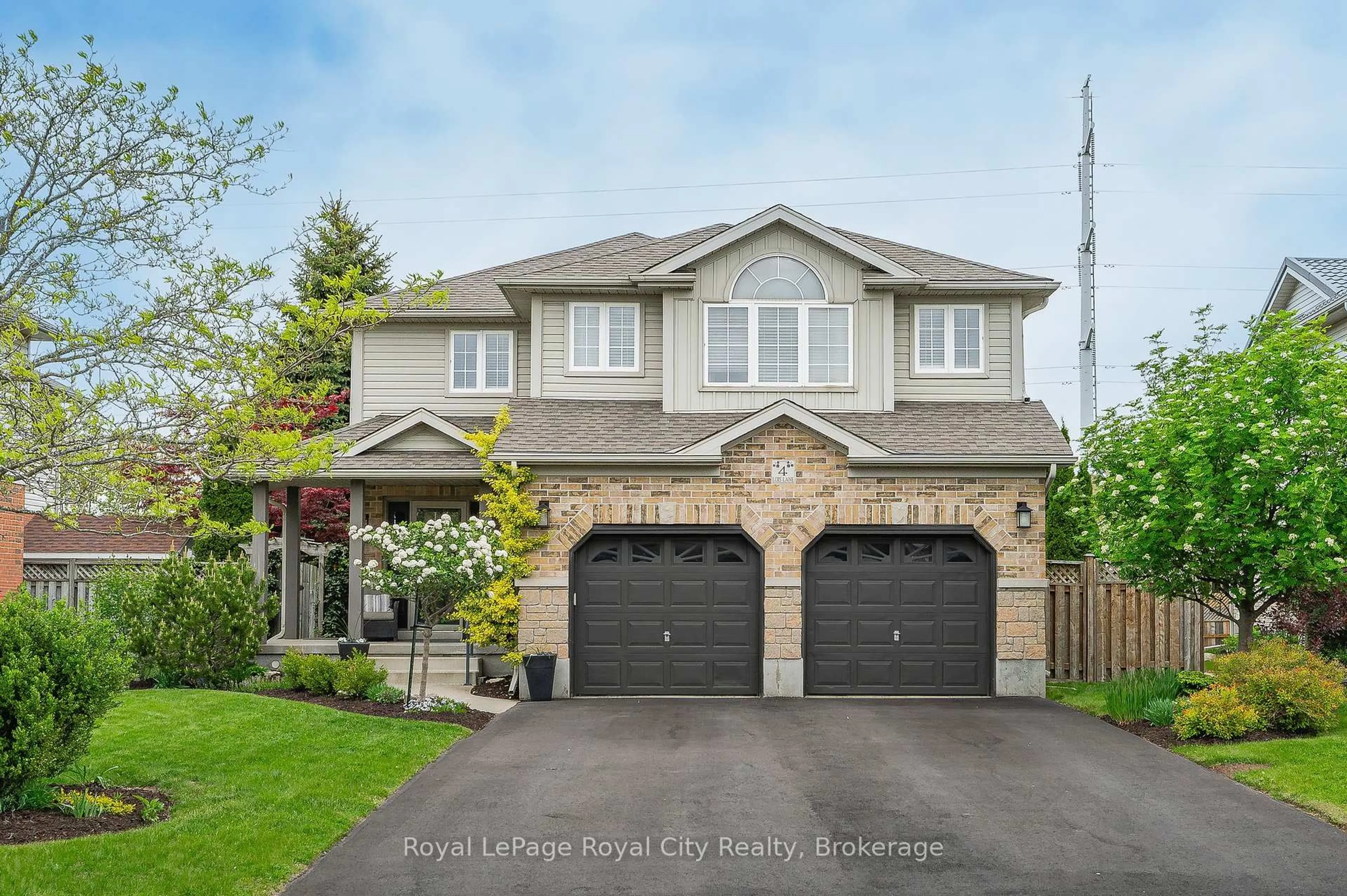 Home with vinyl exterior material, street for 4 Lois Lane, Guelph Ontario N1K 1W7
