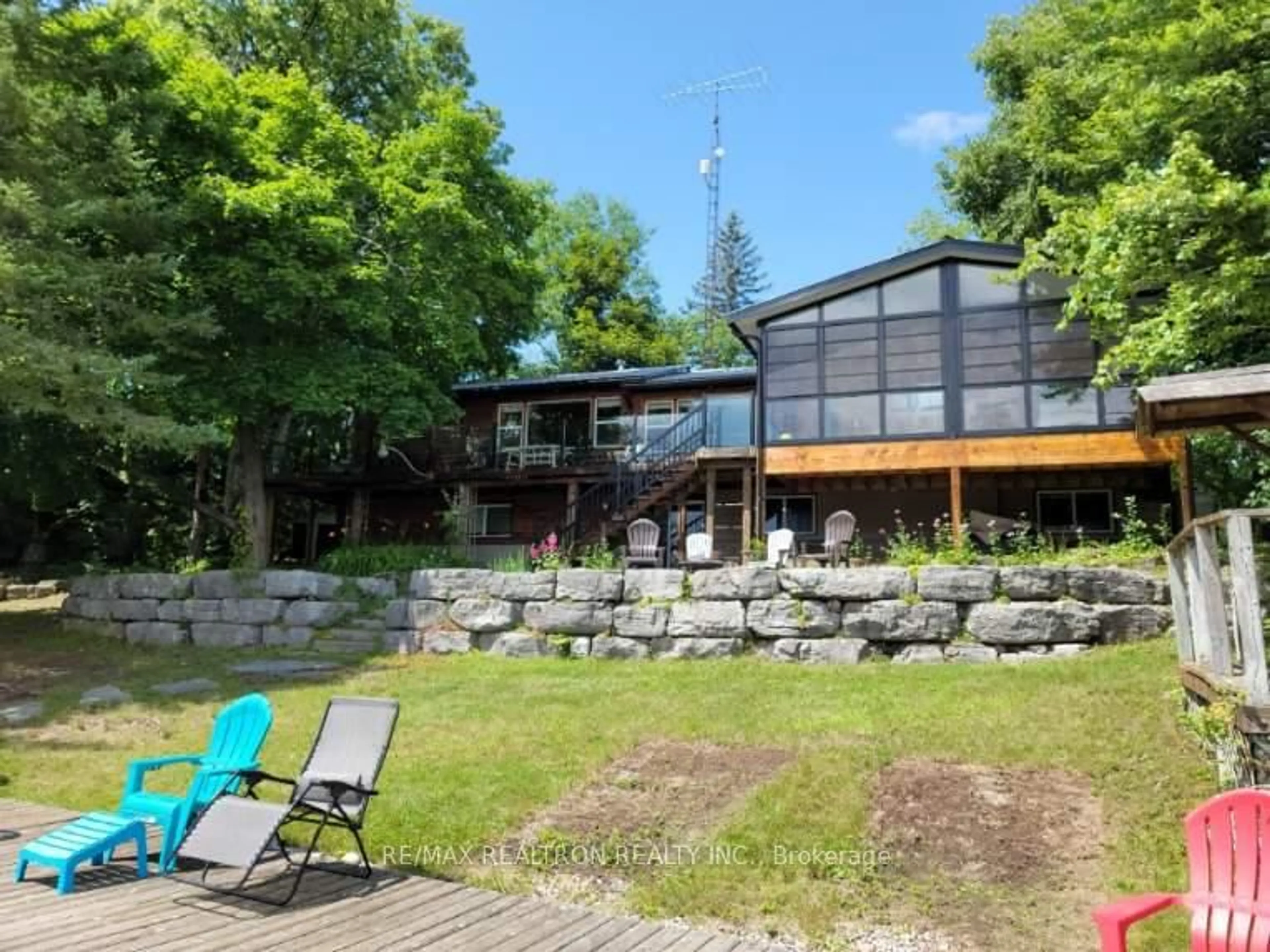A pic from outside/outdoor area/front of a property/back of a property/a pic from drone, water/lake/river/ocean view for 103 Peninsula Dr, Trent Lakes Ontario K0M 1A0