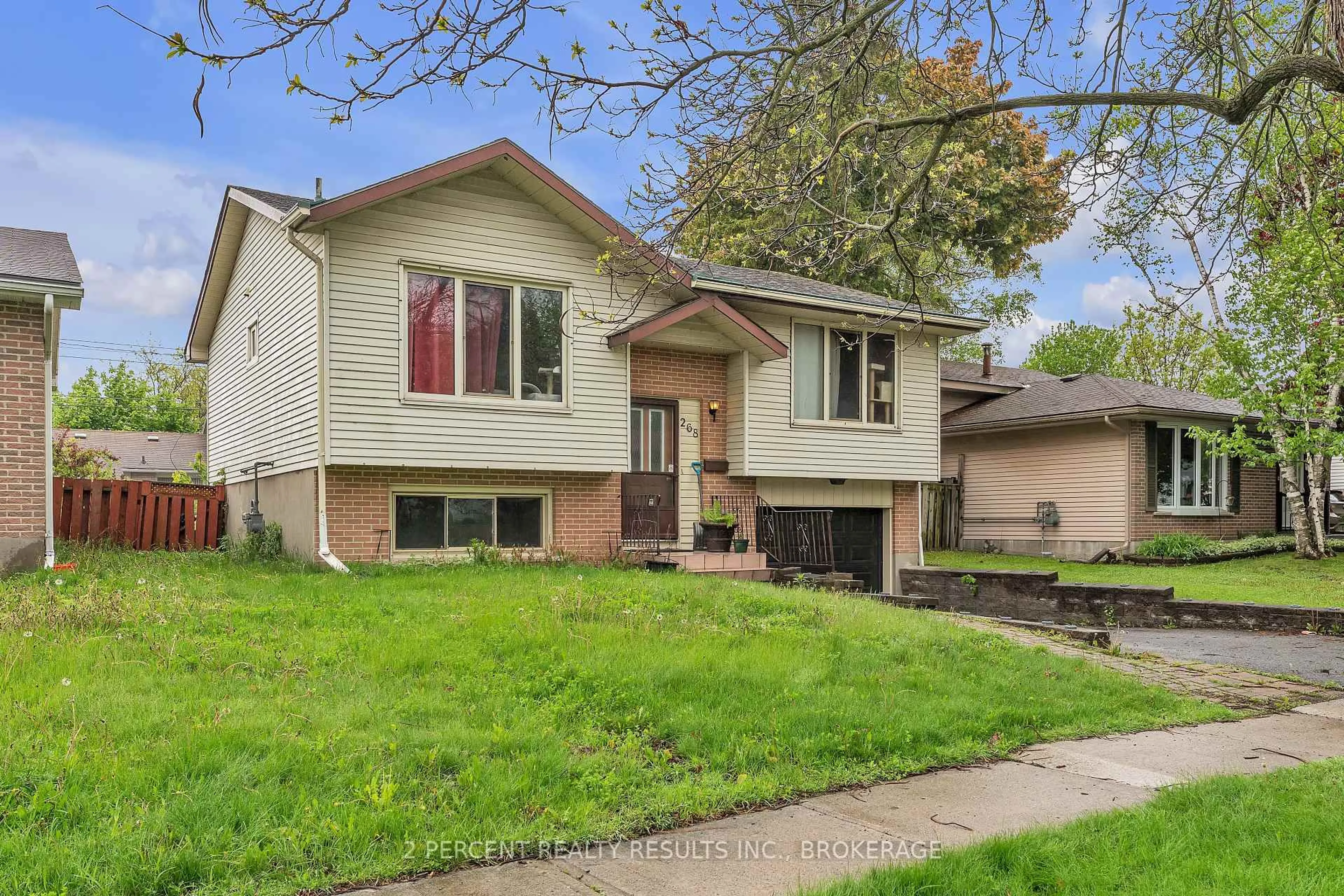 Home with vinyl exterior material, street for 268 Sutherland Dr, Kingston Ontario K7K 5X9
