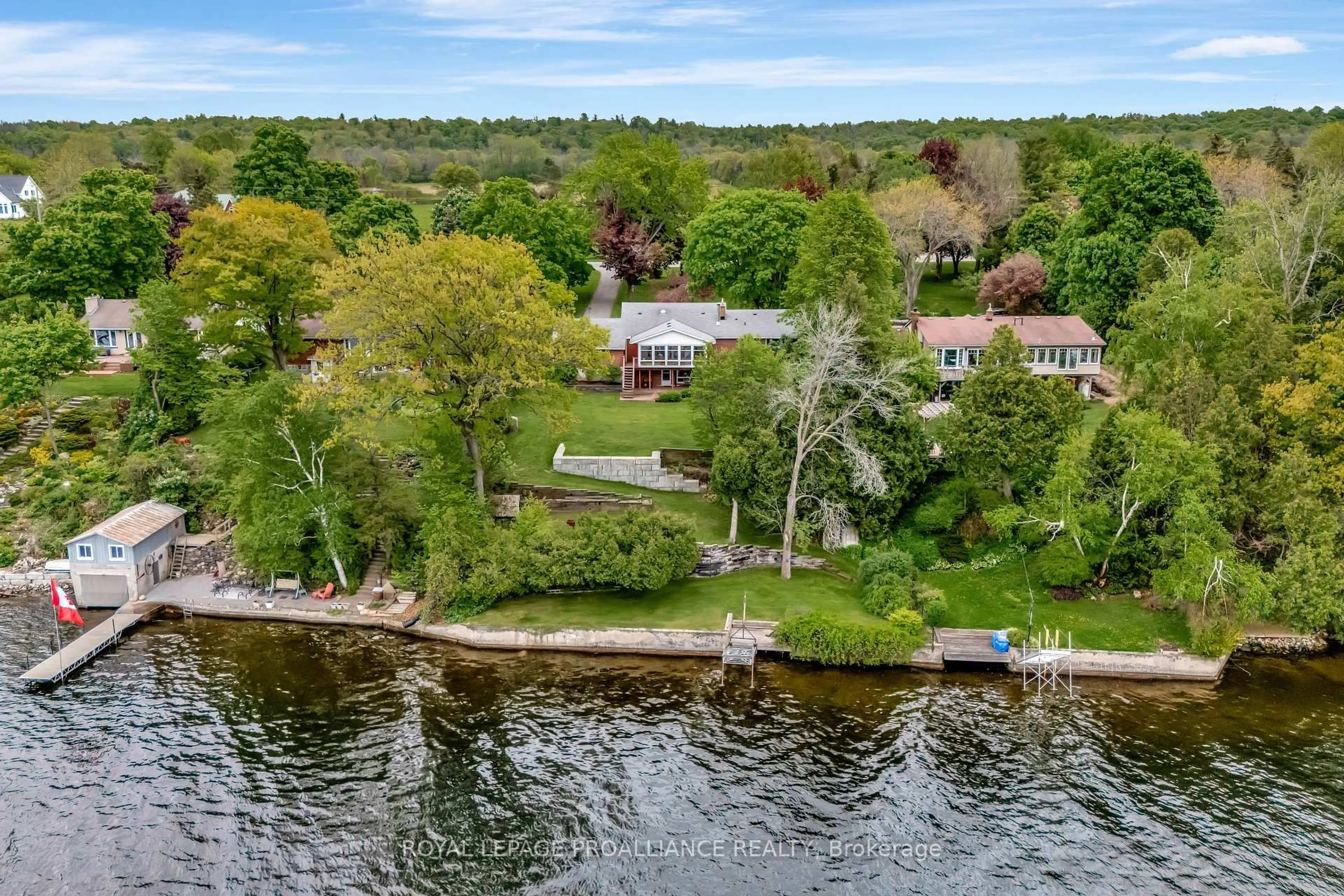A pic from outside/outdoor area/front of a property/back of a property/a pic from drone, water/lake/river/ocean view for 1826 County Rd 3 Rd, Prince Edward County Ontario K0K 1L0