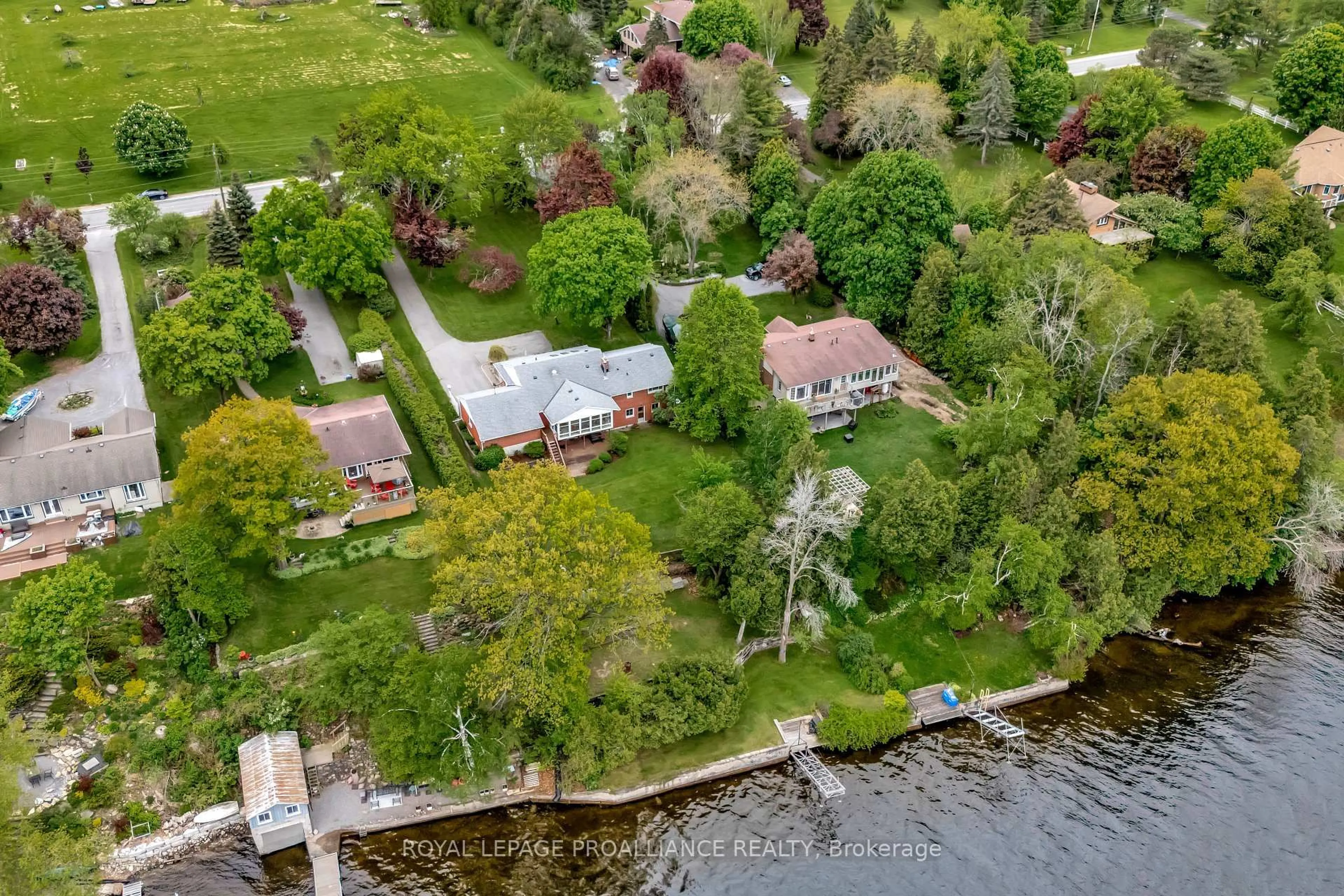A pic from outside/outdoor area/front of a property/back of a property/a pic from drone, water/lake/river/ocean view for 1826 County Rd 3 Rd, Prince Edward County Ontario K0K 1L0