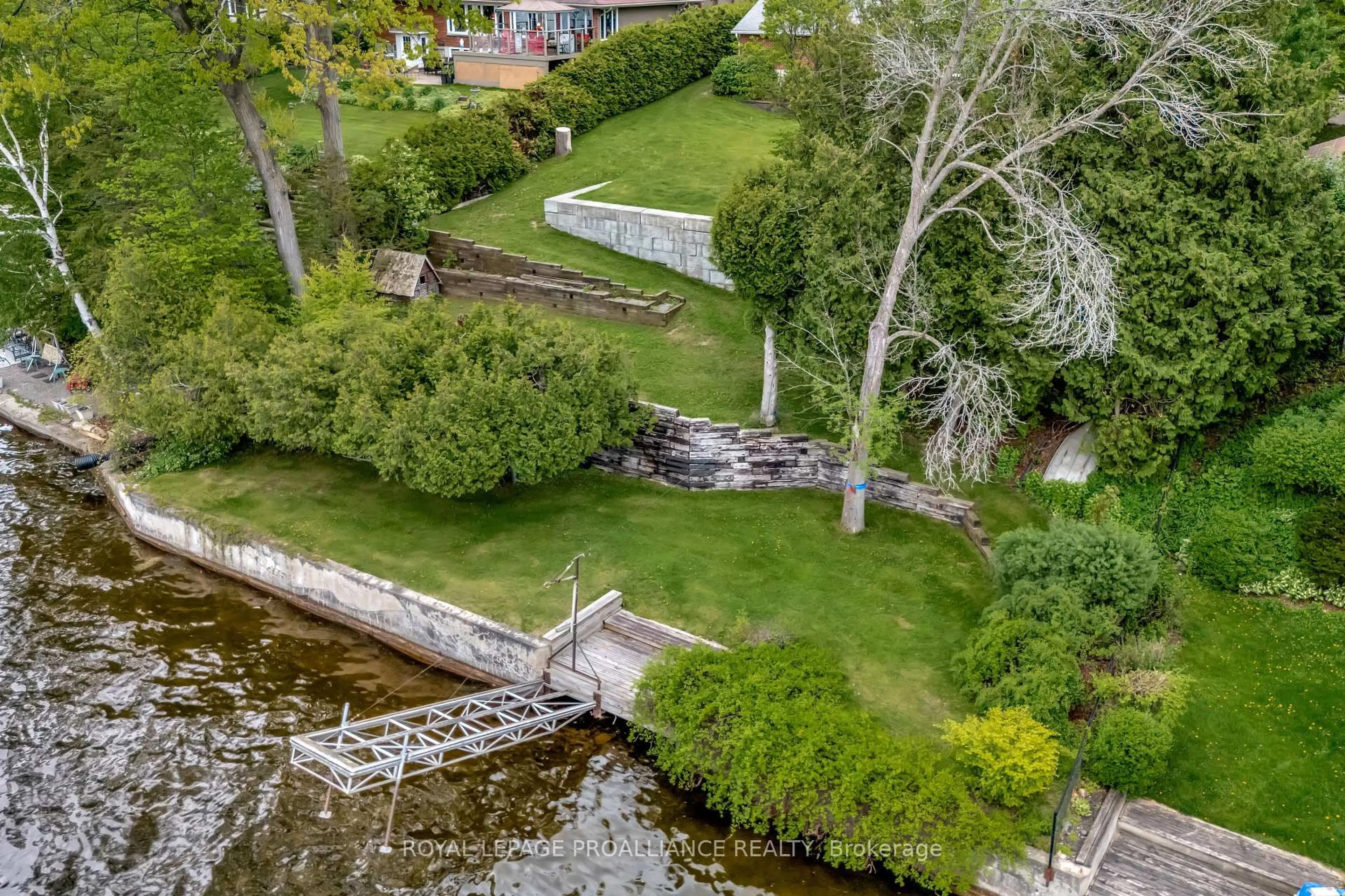 A pic from outside/outdoor area/front of a property/back of a property/a pic from drone, water/lake/river/ocean view for 1826 County Rd 3 Rd, Prince Edward County Ontario K0K 1L0