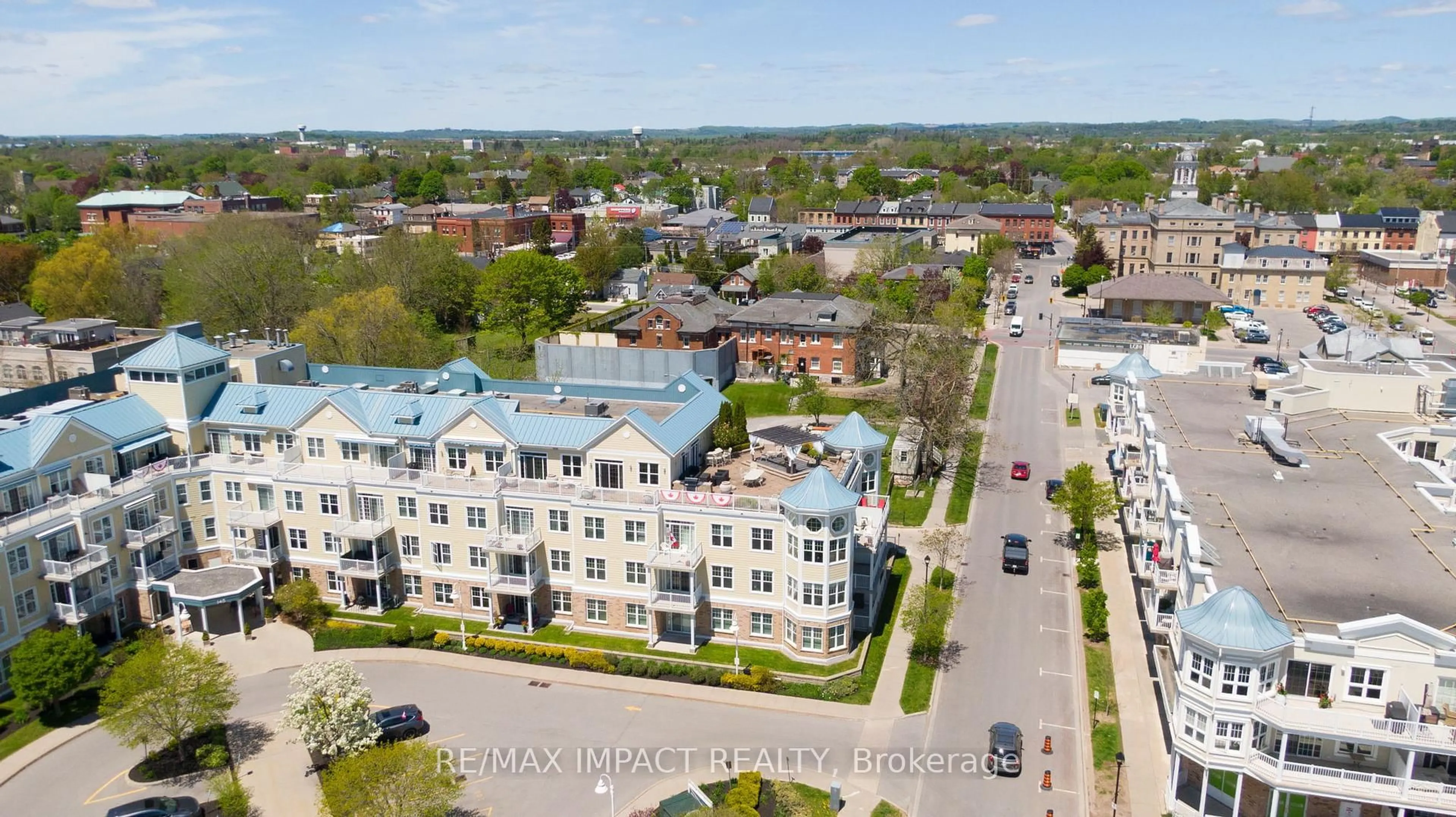 A pic from outside/outdoor area/front of a property/back of a property/a pic from drone, city buildings view from balcony for 145 Third St #105, Cobourg Ontario K9A 5X1