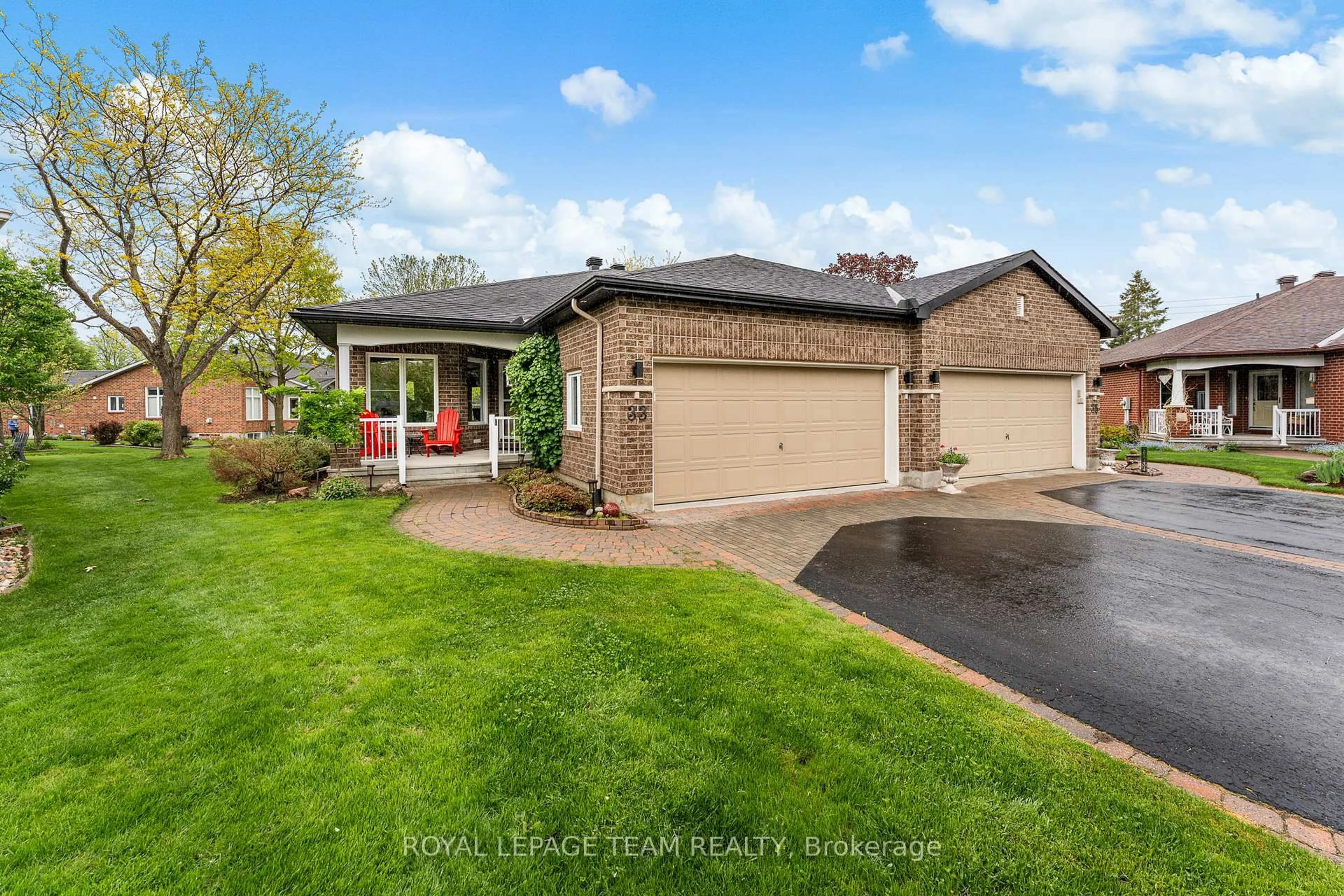 Home with brick exterior material, street for 33 Waterthrush Cres, Ottawa Ontario K2M 2T8