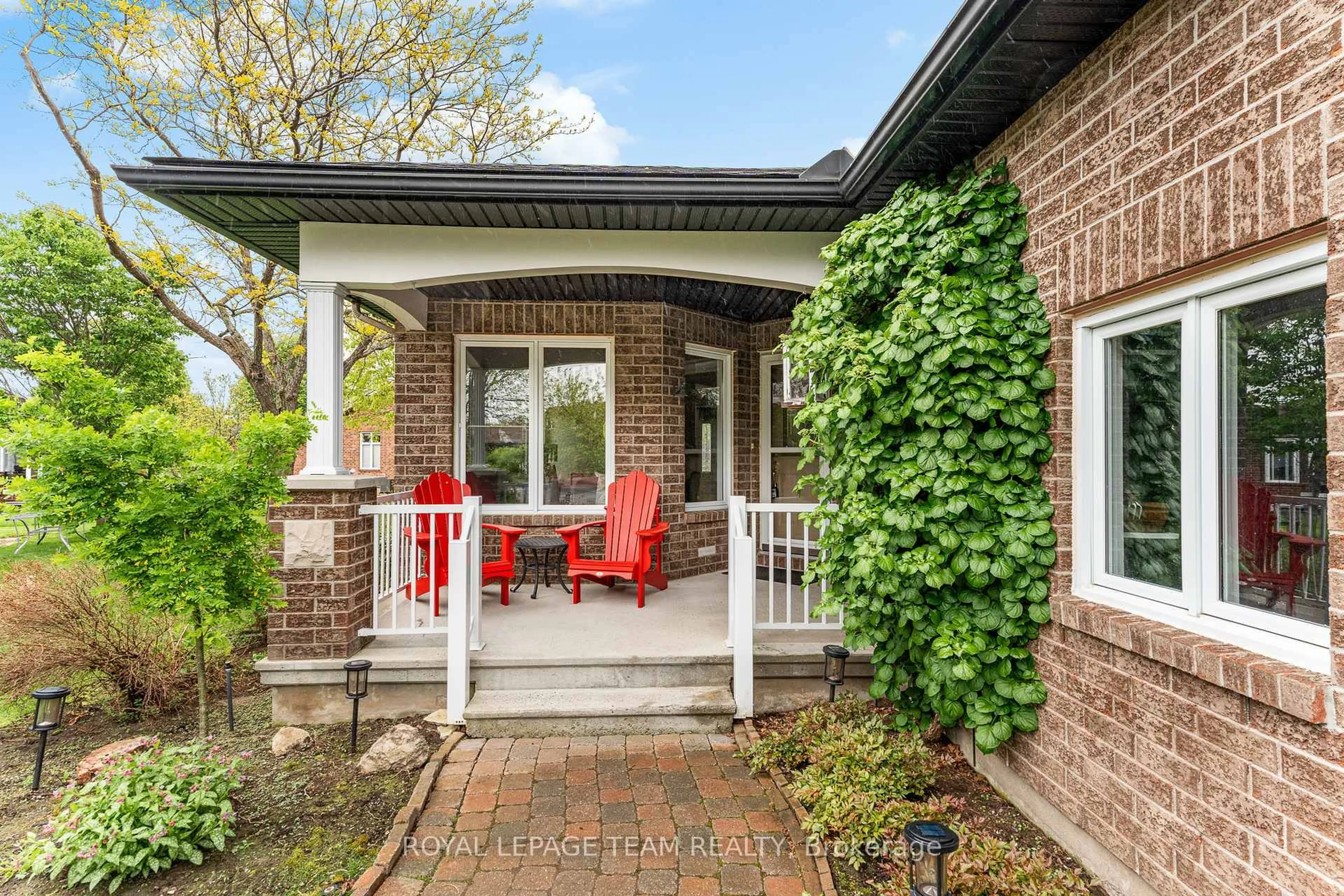Home with brick exterior material, street for 33 Waterthrush Cres, Ottawa Ontario K2M 2T8