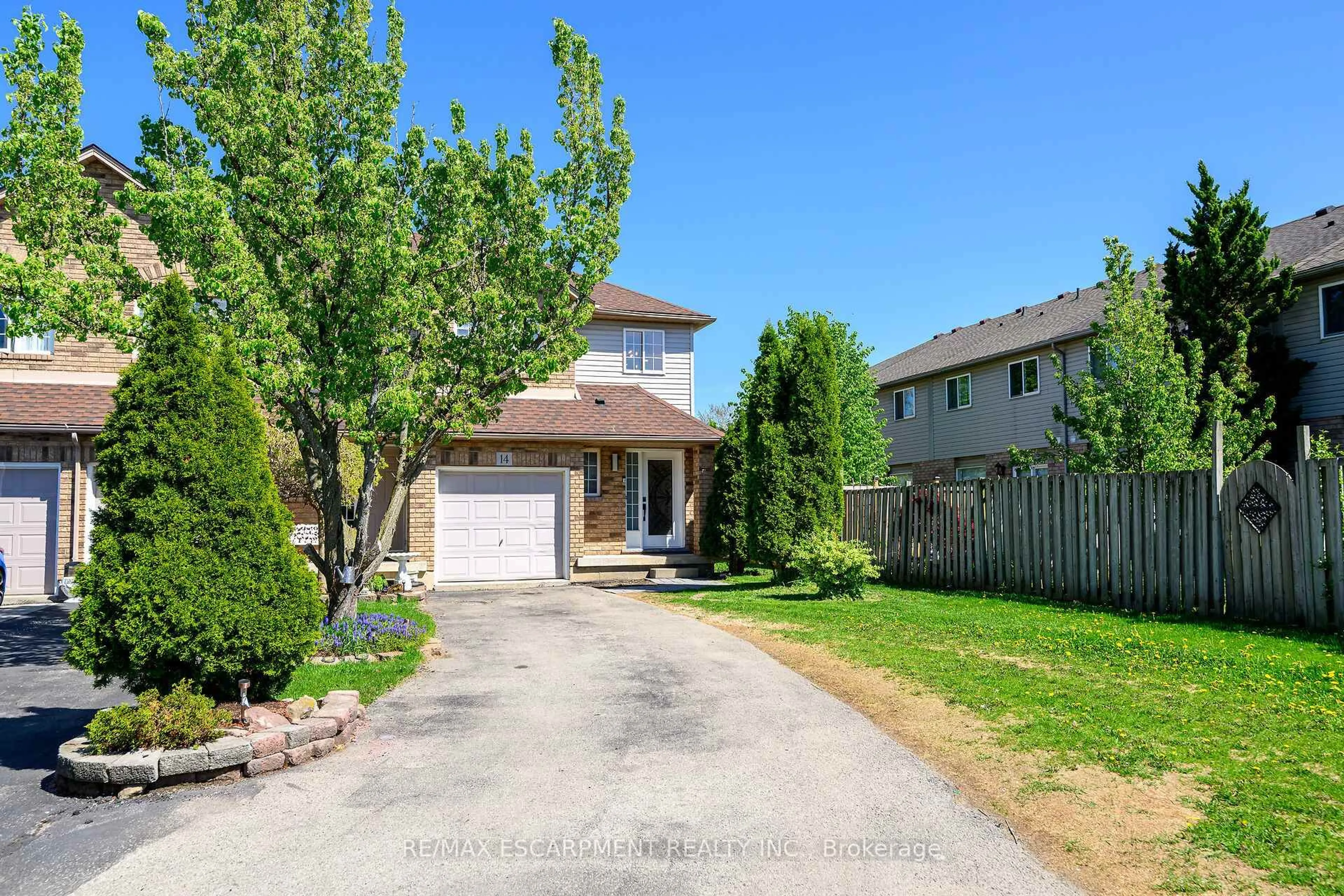 A pic from outside/outdoor area/front of a property/back of a property/a pic from drone, street for 134 Terni Blvd #14, Hamilton Ontario L8W 3Y9