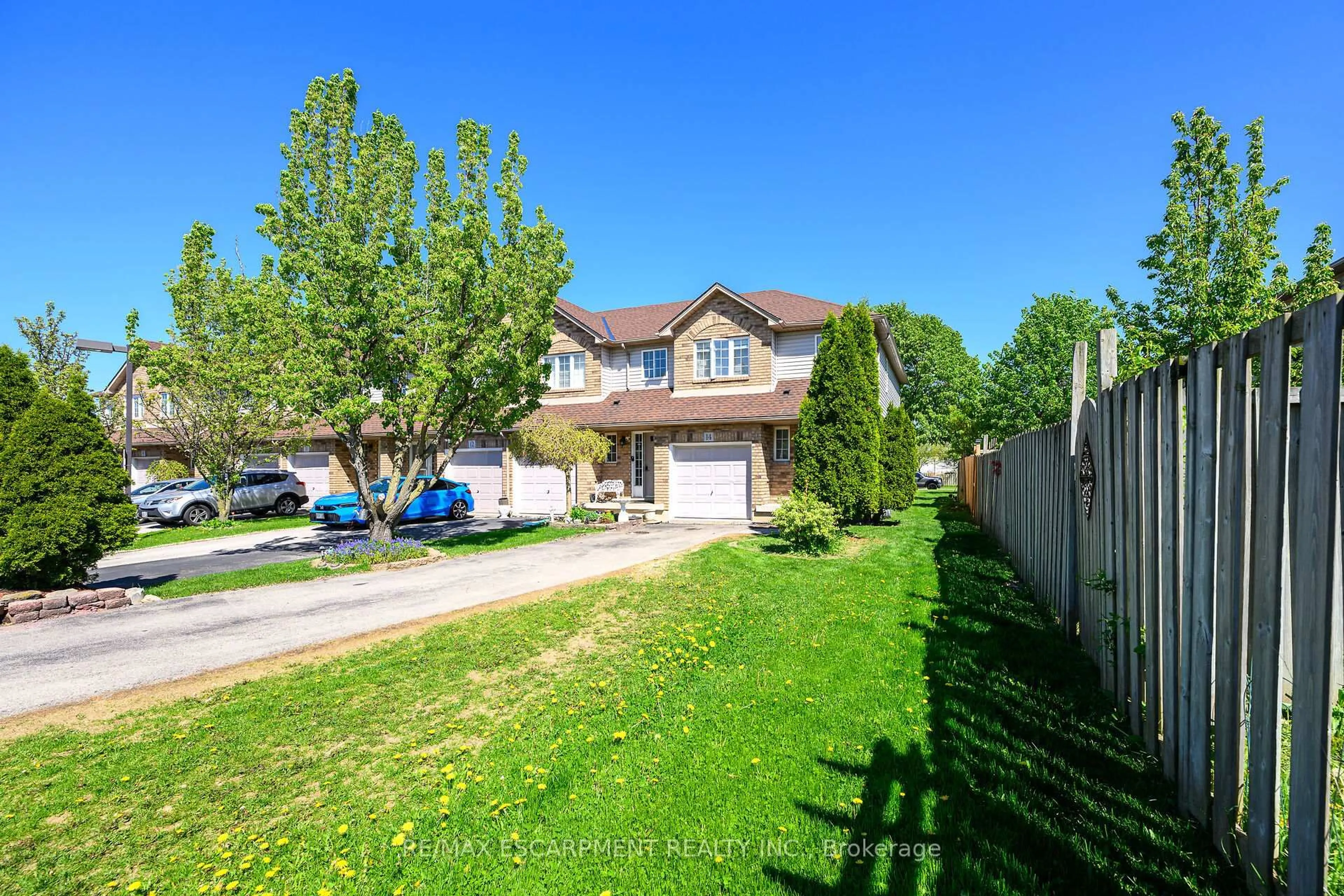 A pic from outside/outdoor area/front of a property/back of a property/a pic from drone, street for 134 Terni Blvd #14, Hamilton Ontario L8W 3Y9