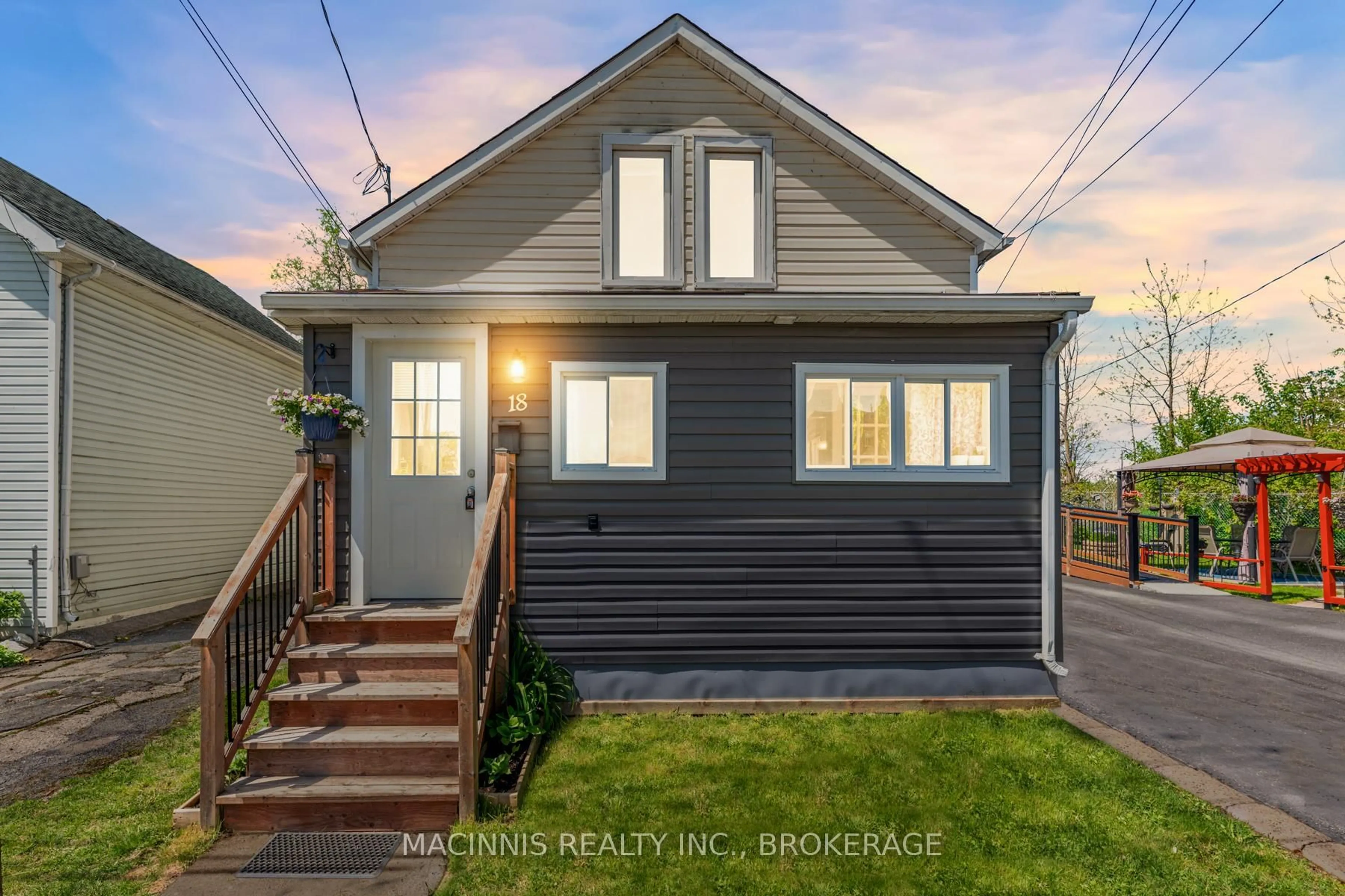 Home with vinyl exterior material, street for 18 Orchard St, Kingston Ontario K7K 2Z4