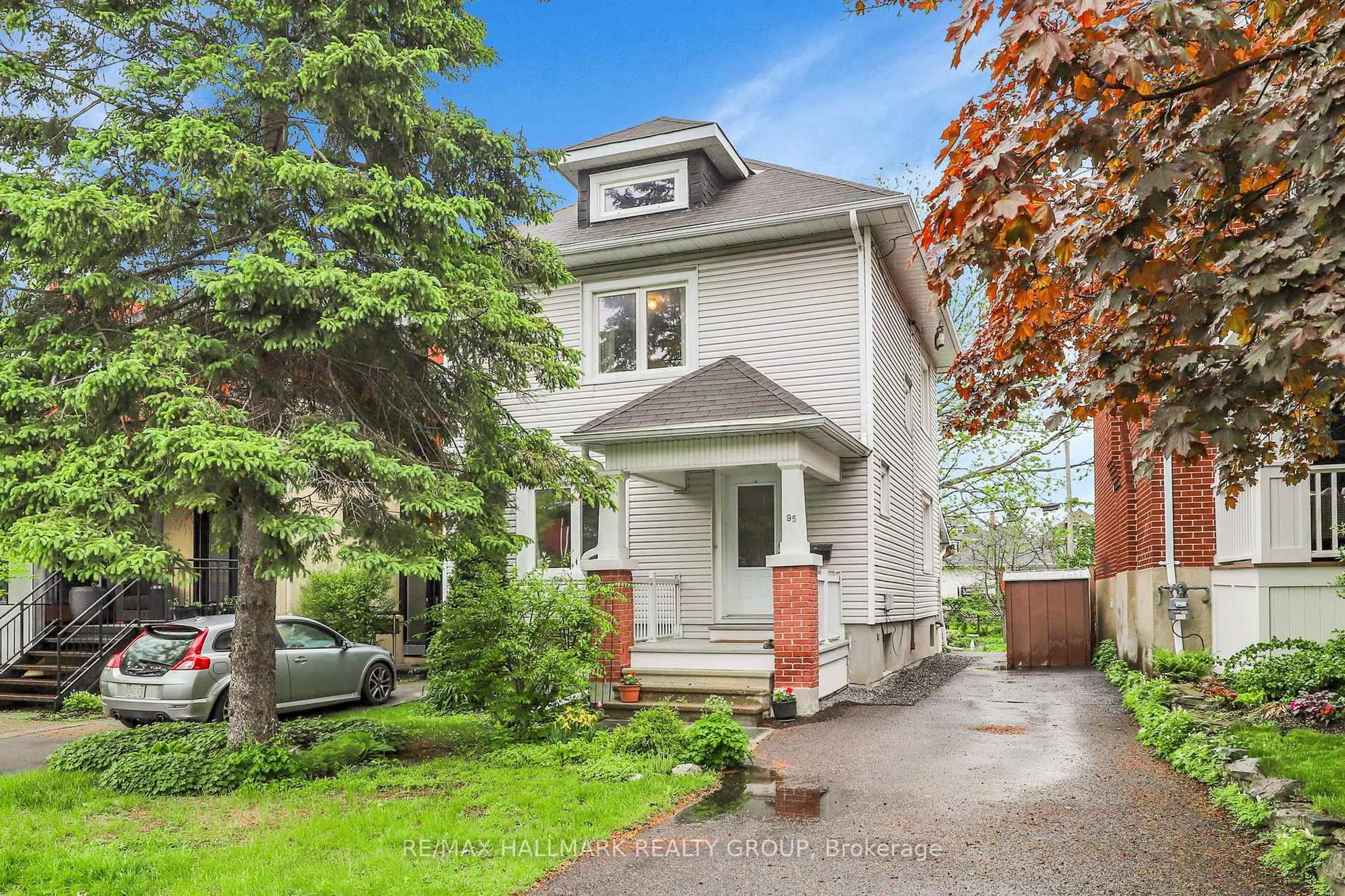 Home with vinyl exterior material, street for 95 Gilchrist Ave, Ottawa Ontario K1Y 0M9