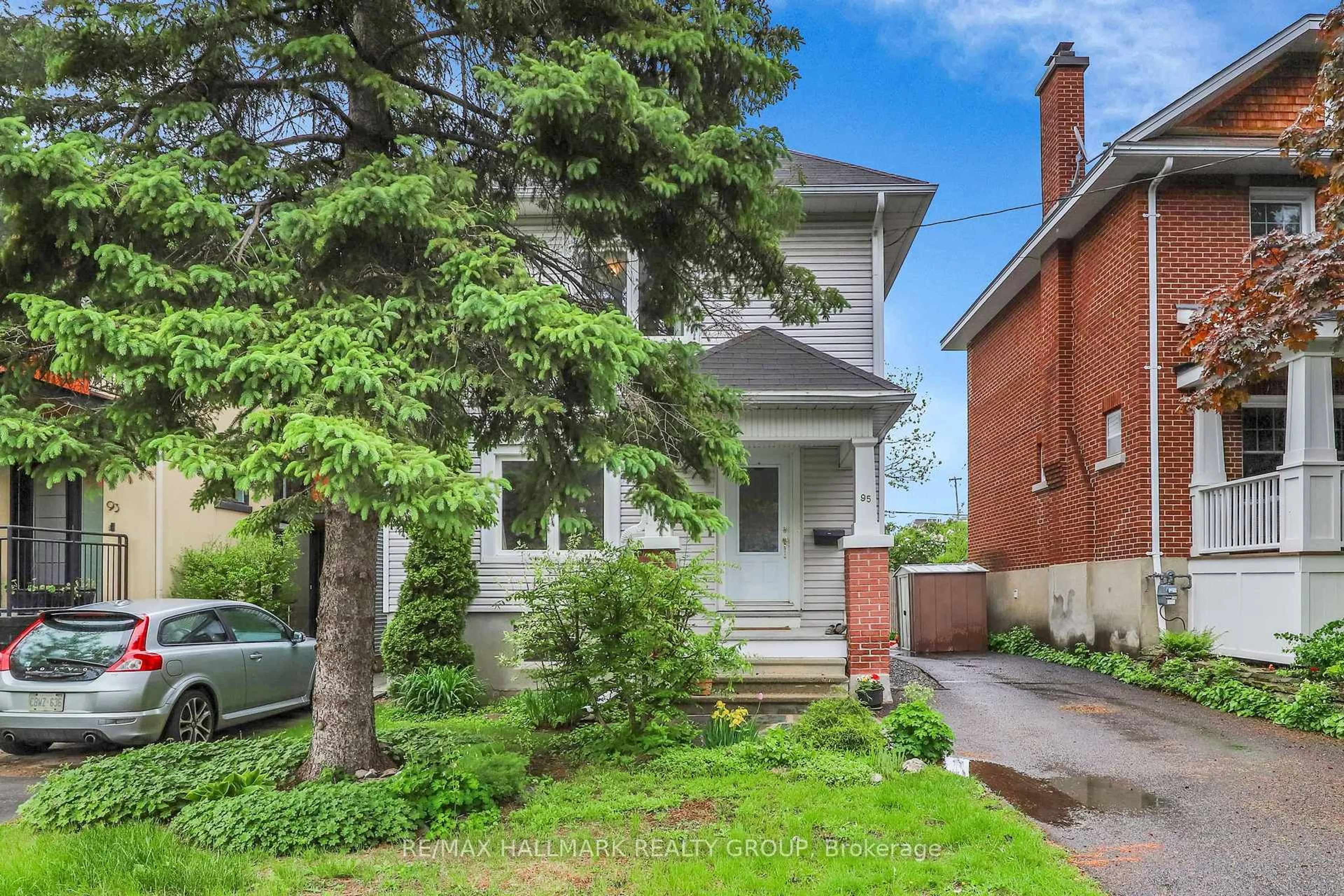 Home with brick exterior material, street for 95 Gilchrist Ave, Ottawa Ontario K1Y 0M9
