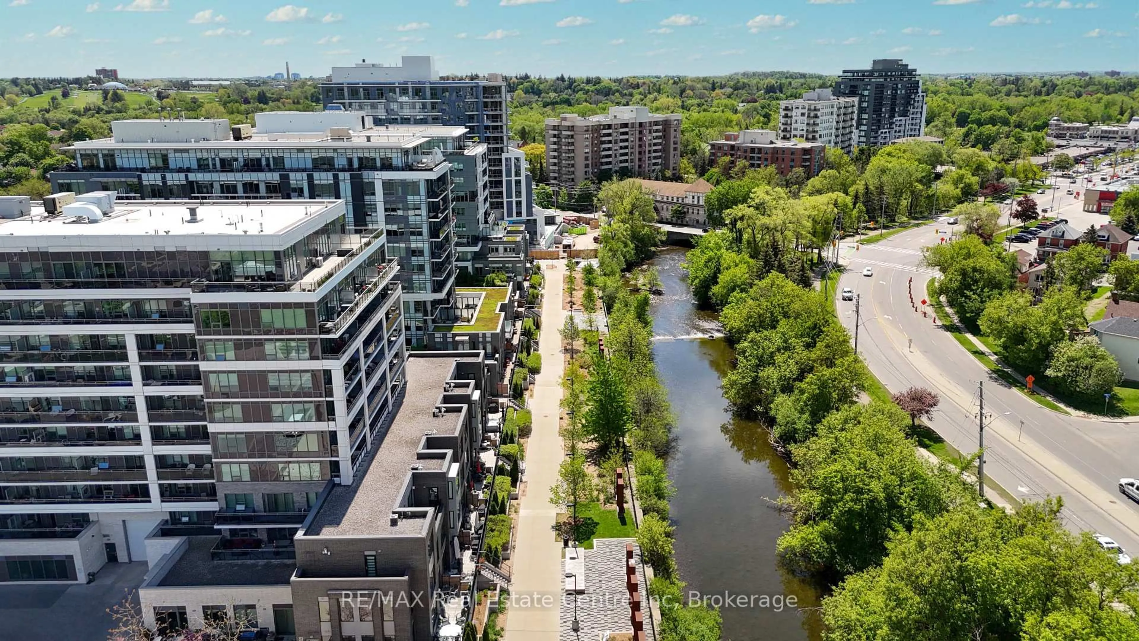 A pic from outside/outdoor area/front of a property/back of a property/a pic from drone, city buildings view from balcony for 63 Arthur St #201, Guelph Ontario N1H 4C1