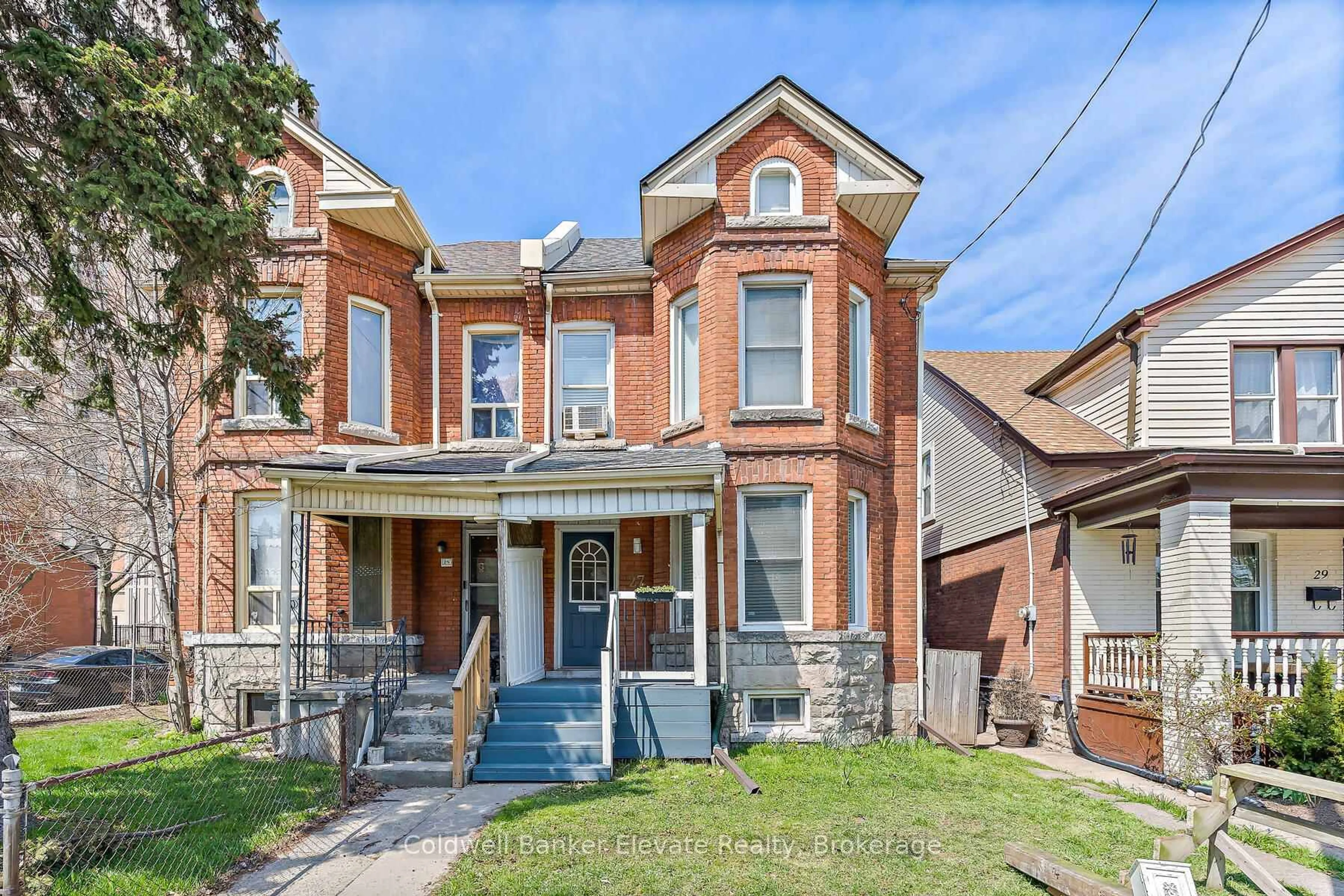 Home with brick exterior material, street for 27 Tisdale St, Hamilton Ontario L8L 5M3