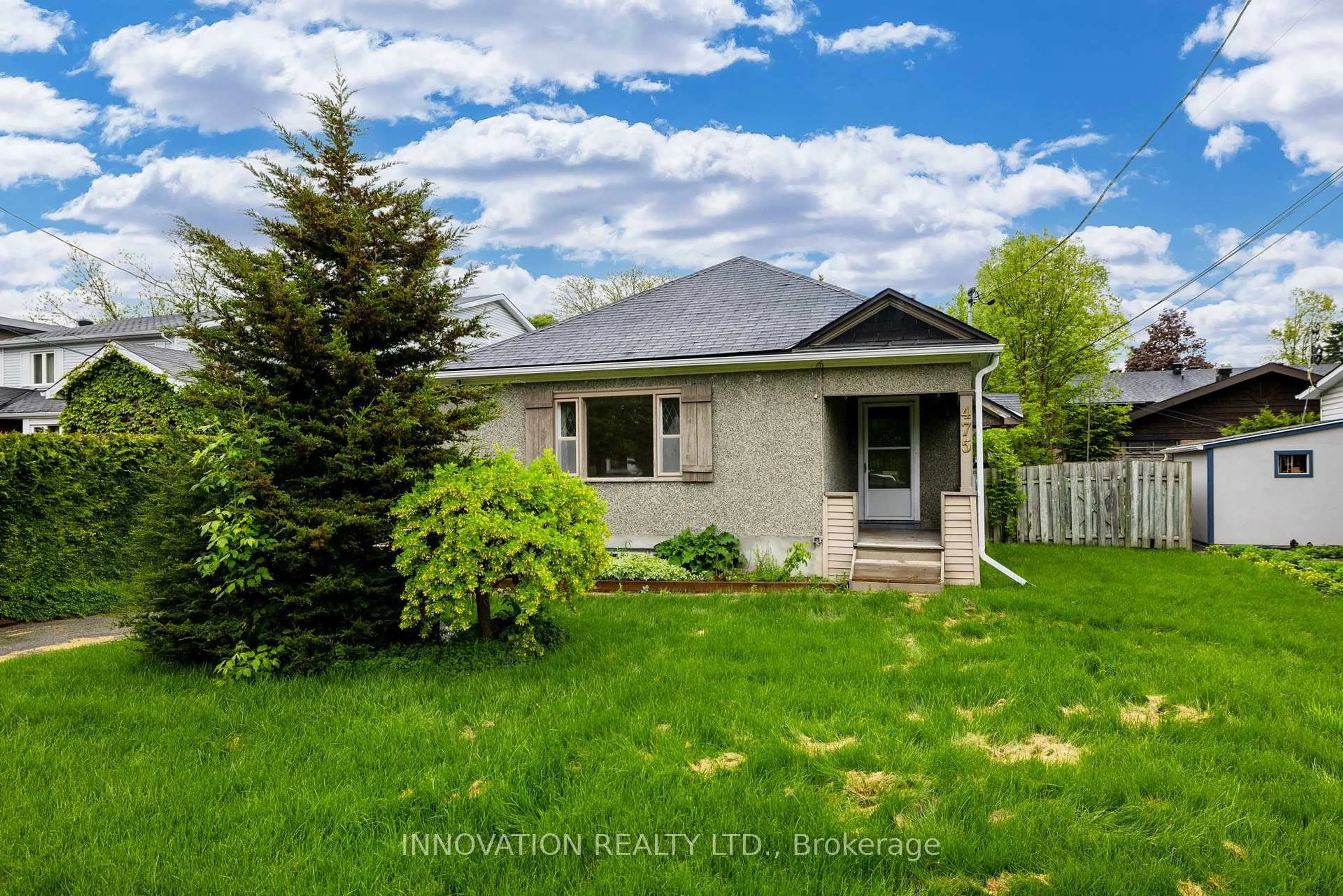A pic from outside/outdoor area/front of a property/back of a property/a pic from drone, unknown for 475 Woodland Ave, Ottawa Ontario K2B 5E3