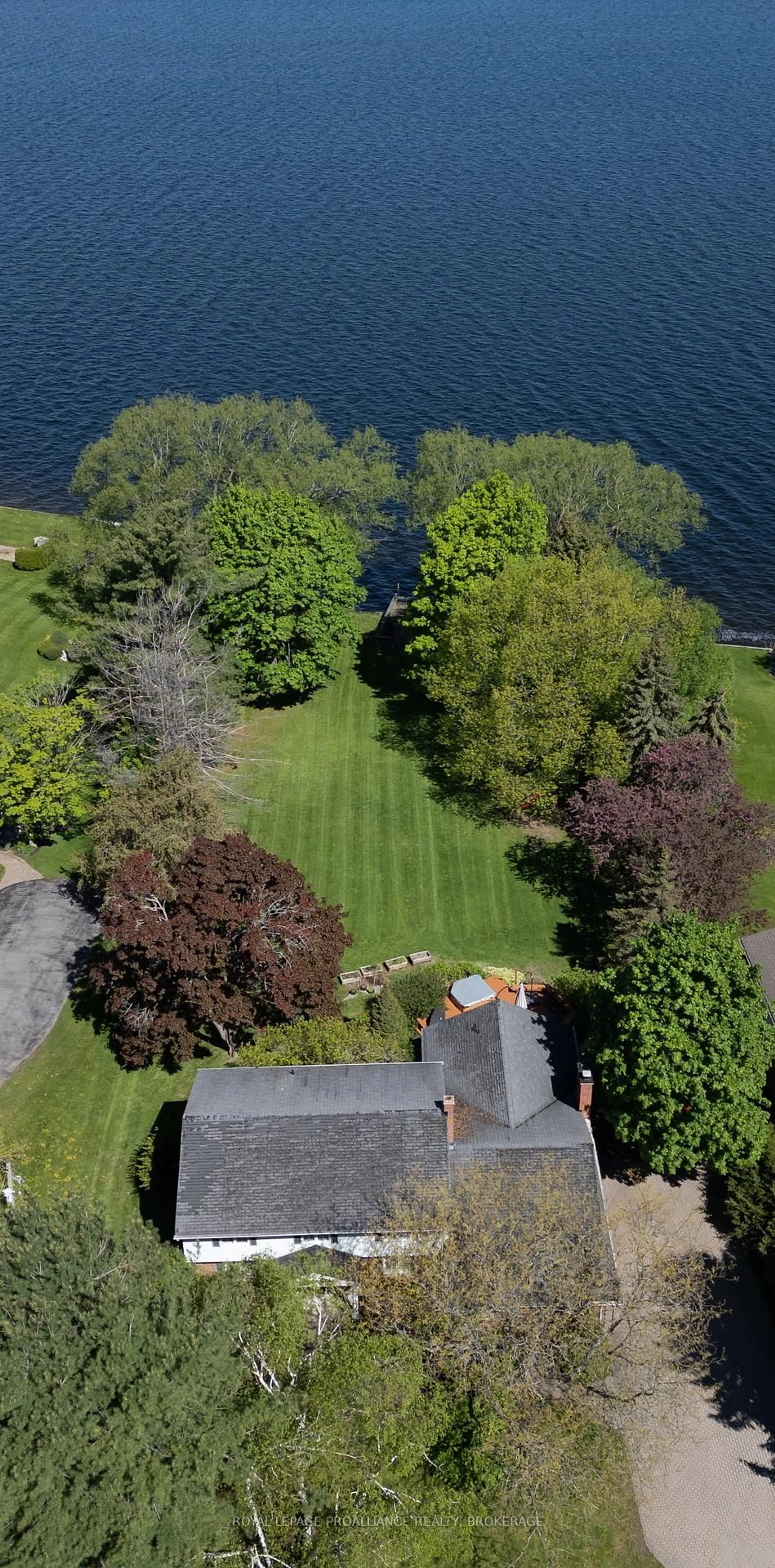 A pic from outside/outdoor area/front of a property/back of a property/a pic from drone, water/lake/river/ocean view for 1060 County Road 3 N/A, Prince Edward County Ontario K8N 4Z1