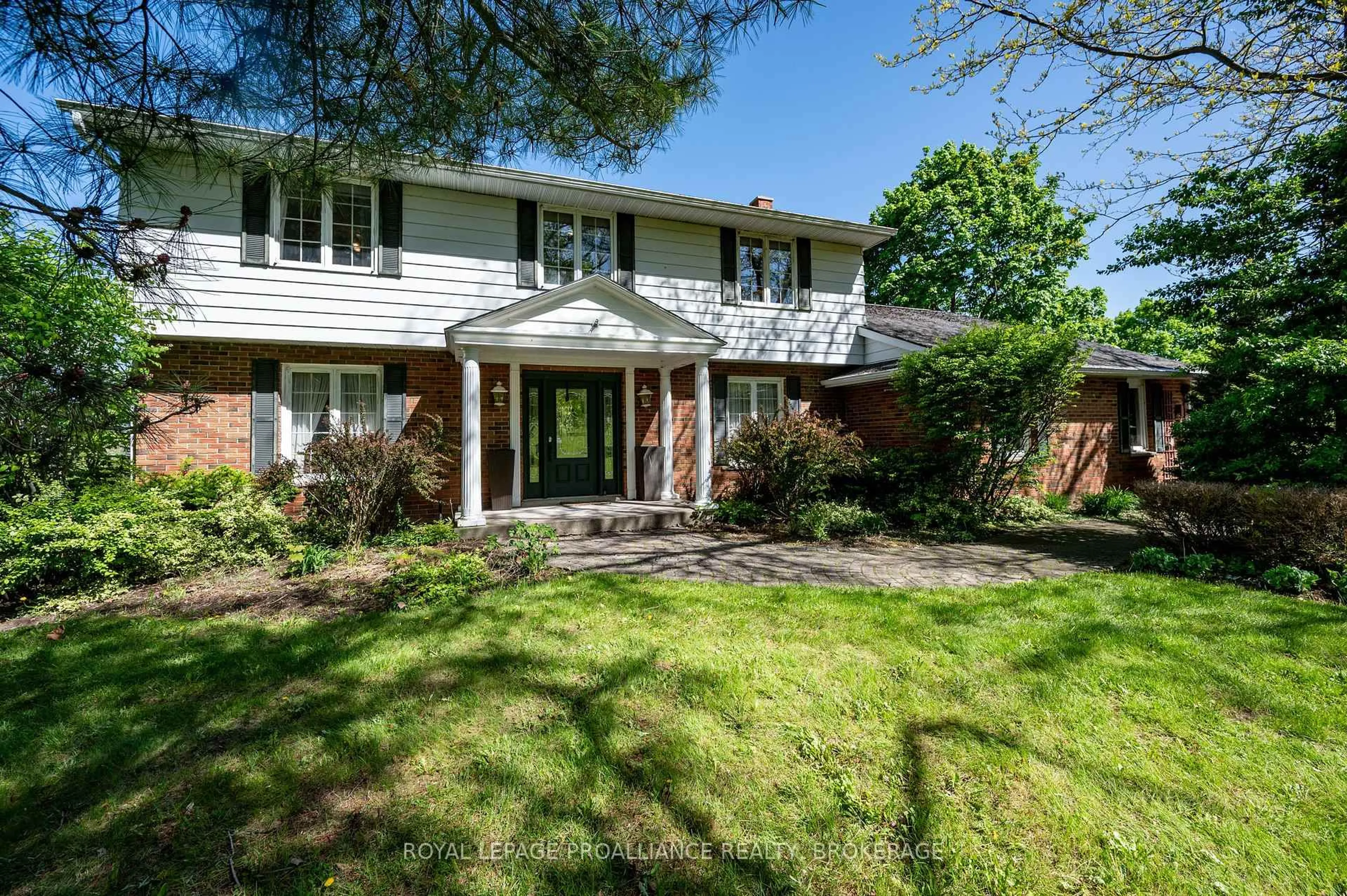 Home with brick exterior material, street for 1060 County Road 3 N/A, Prince Edward County Ontario K8N 4Z1