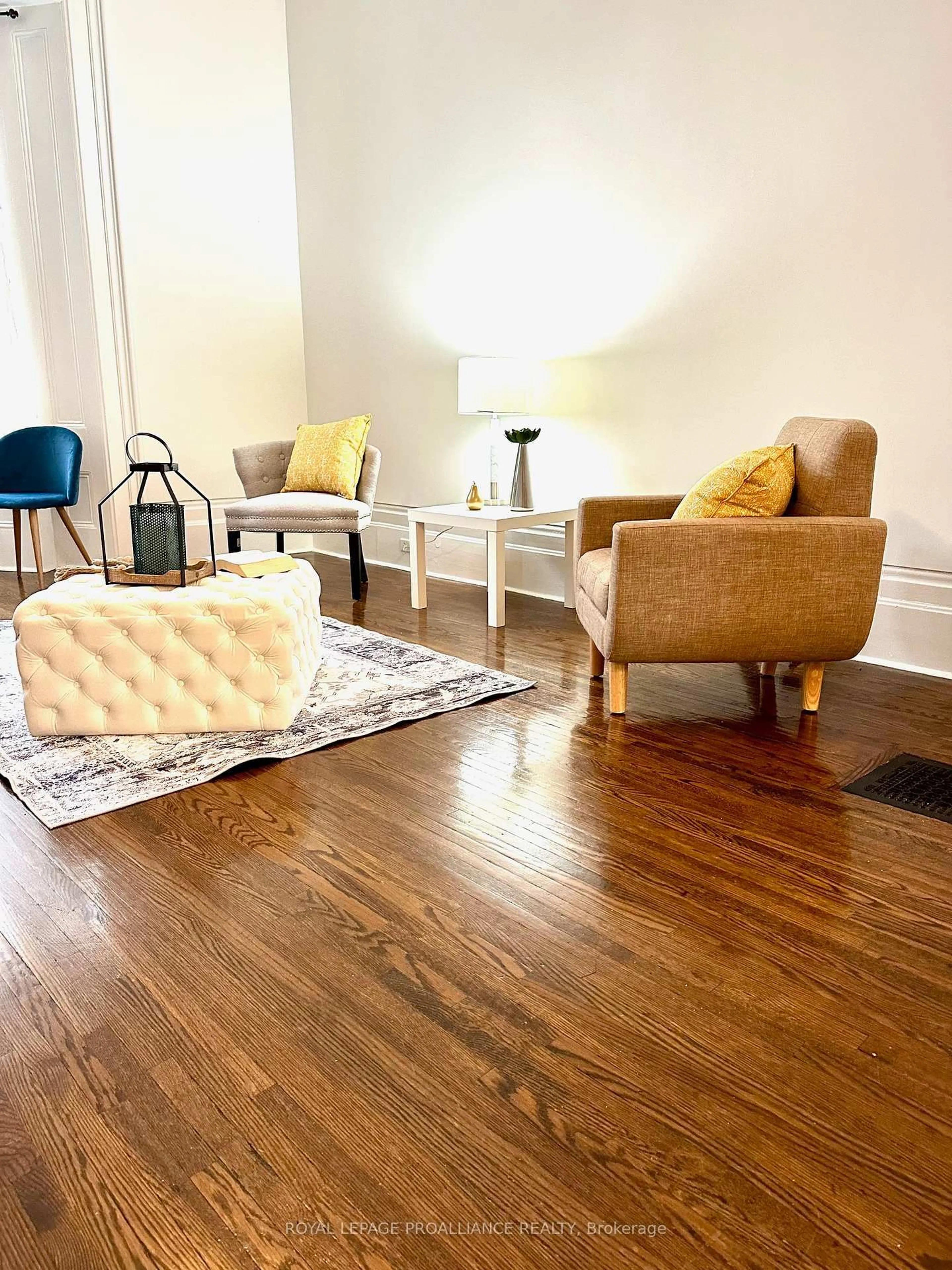 Living room with furniture, wood/laminate floor for 237 John St #3, Belleville Ontario K8N 3G2