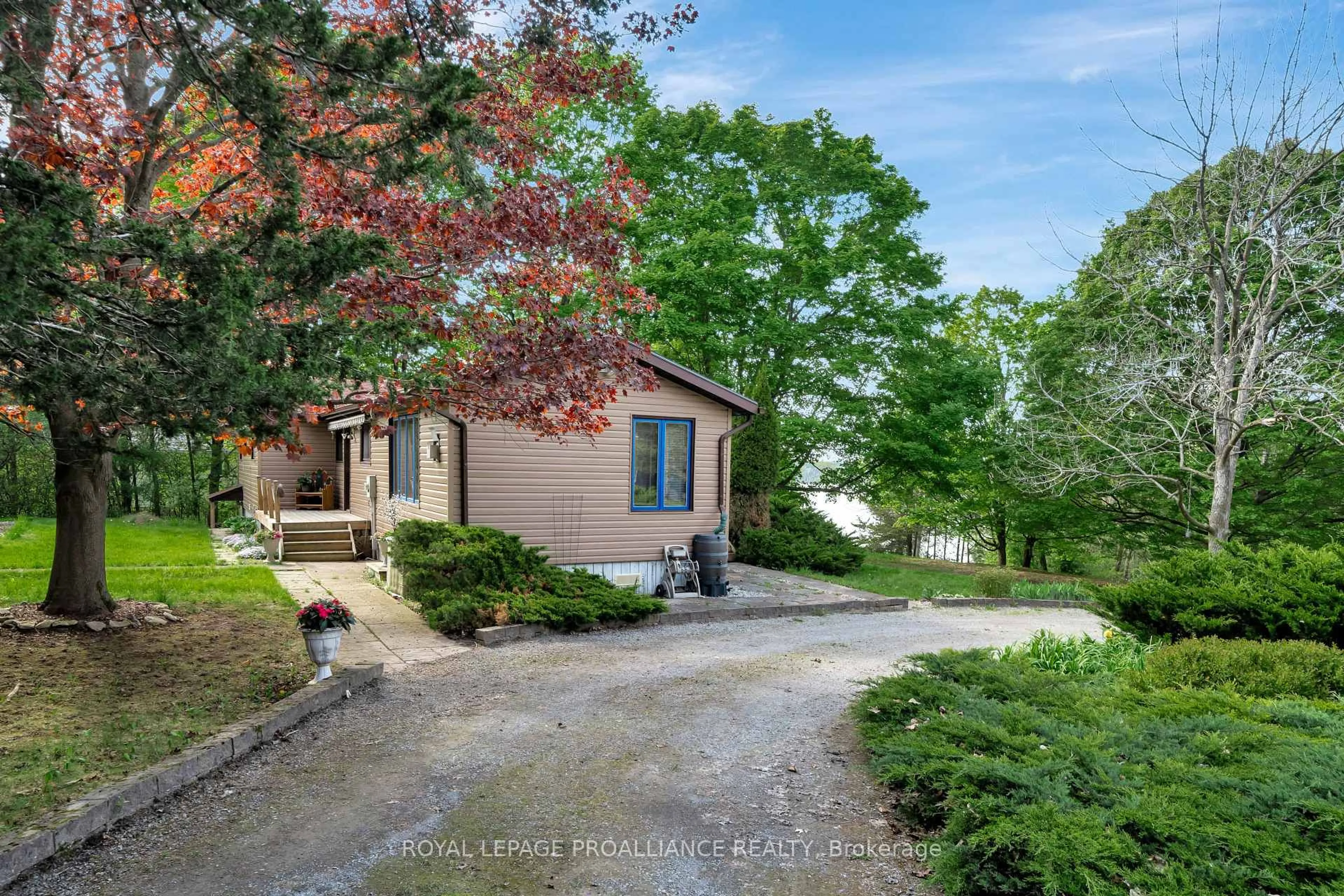 A pic from outside/outdoor area/front of a property/back of a property/a pic from drone, unknown for 12112C Loyalist Pkwy, Prince Edward County Ontario K0K 2T0