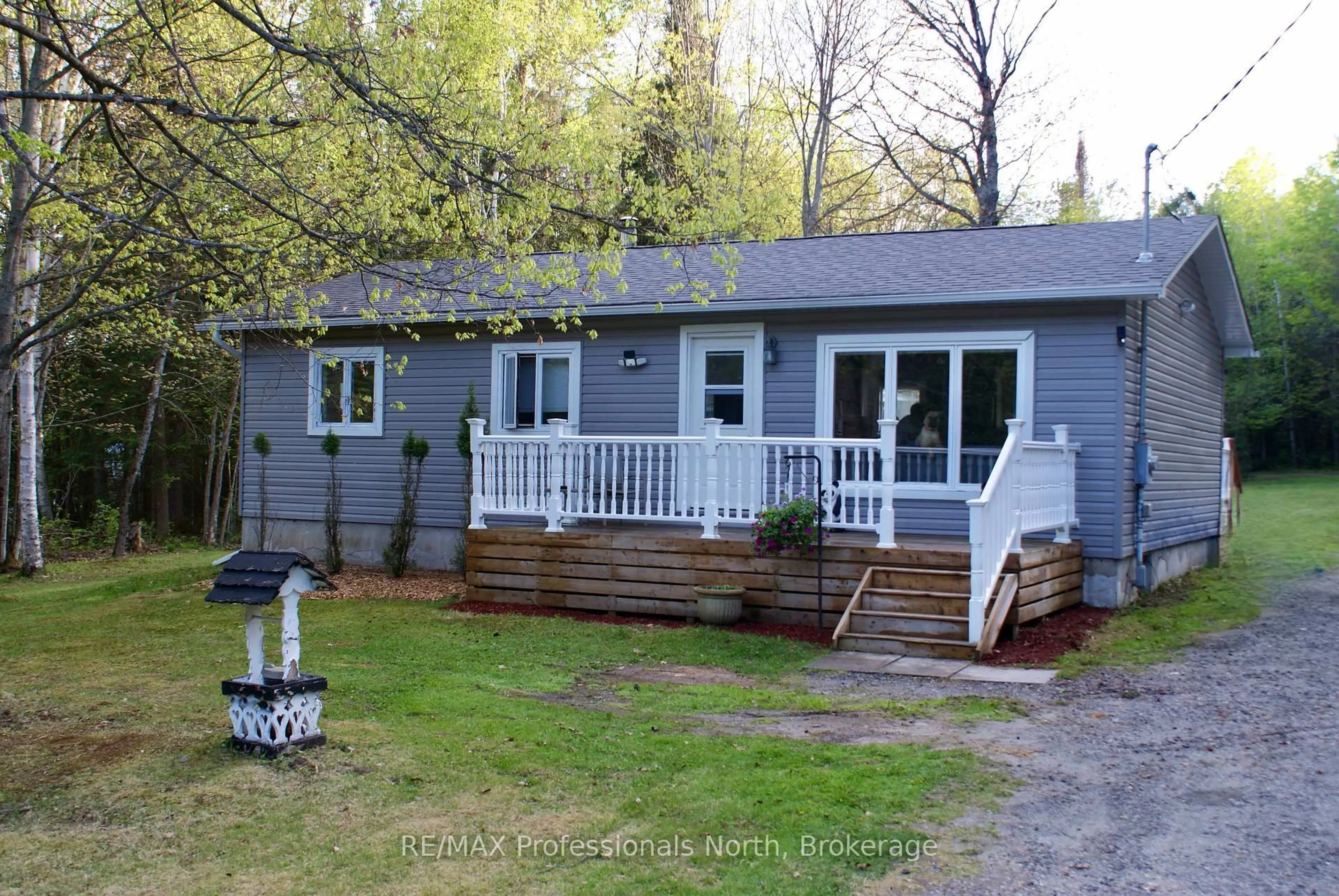 A pic from outside/outdoor area/front of a property/back of a property/a pic from drone, street for 1135 Lochlin Rd, Minden Hills Ontario K0M 2K0