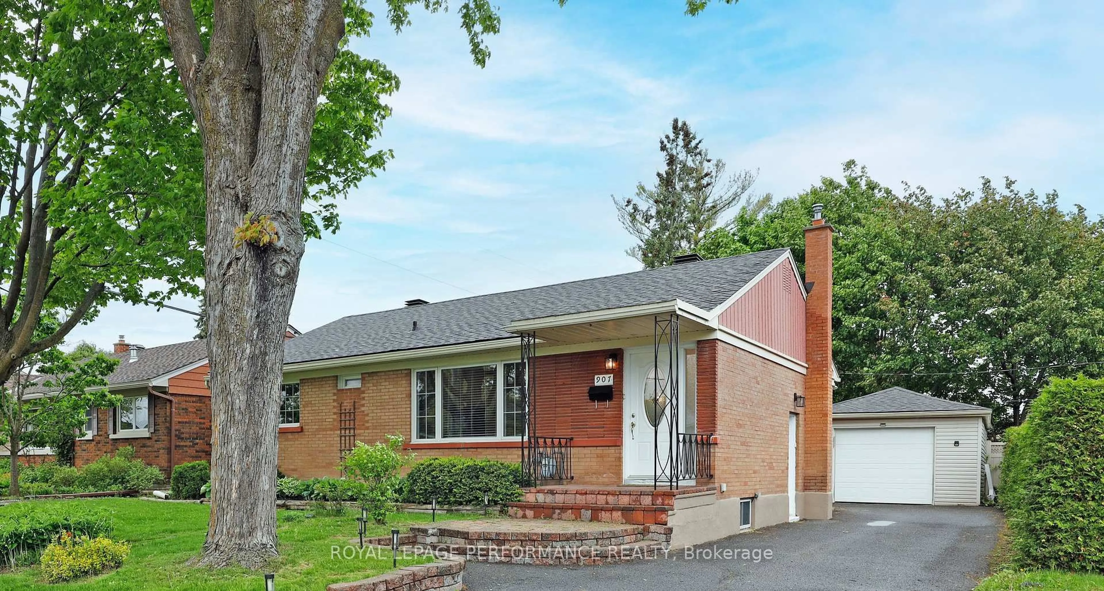 Home with brick exterior material, street for 907 Elsett Dr, Ottawa Ontario K1G 2S4