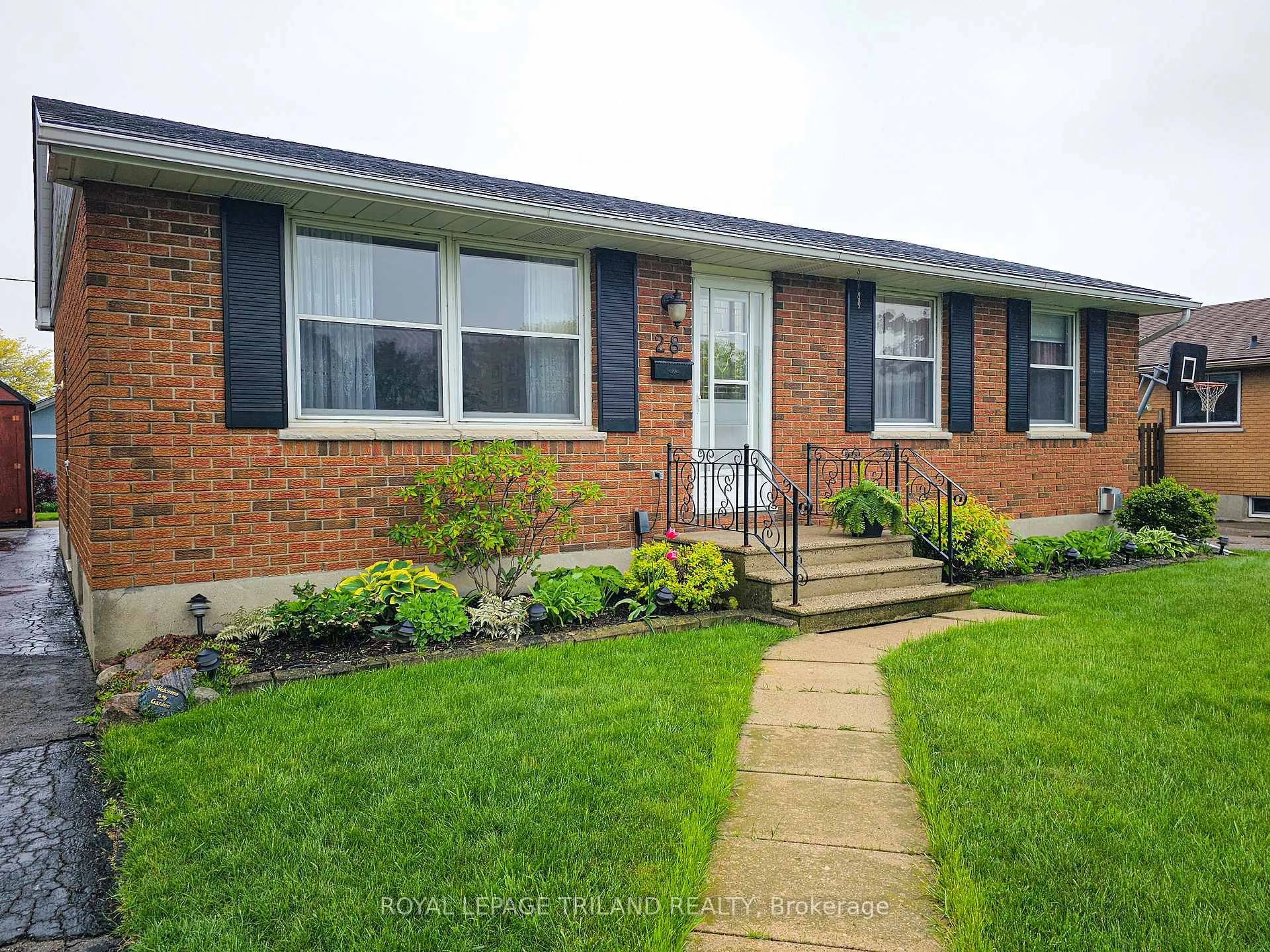 Home with brick exterior material, street for 28 Raven Ave, St. Thomas Ontario N5R 5L1