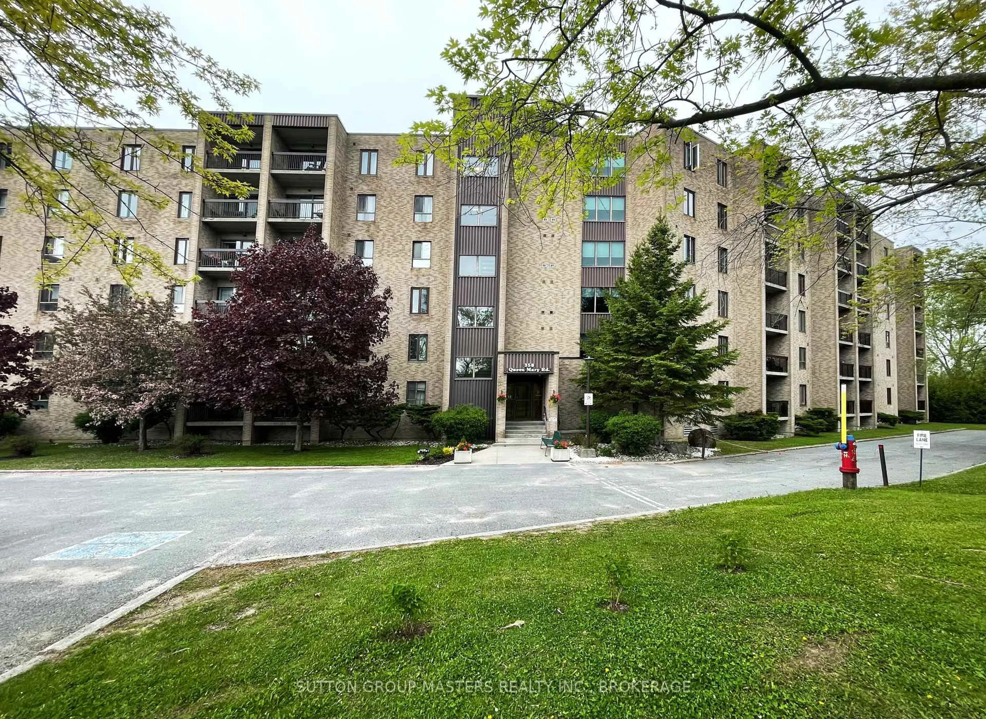 A pic from outside/outdoor area/front of a property/back of a property/a pic from drone, unknown for 358 Queen Mary Rd #314, Kingston Ontario K7M 7E8
