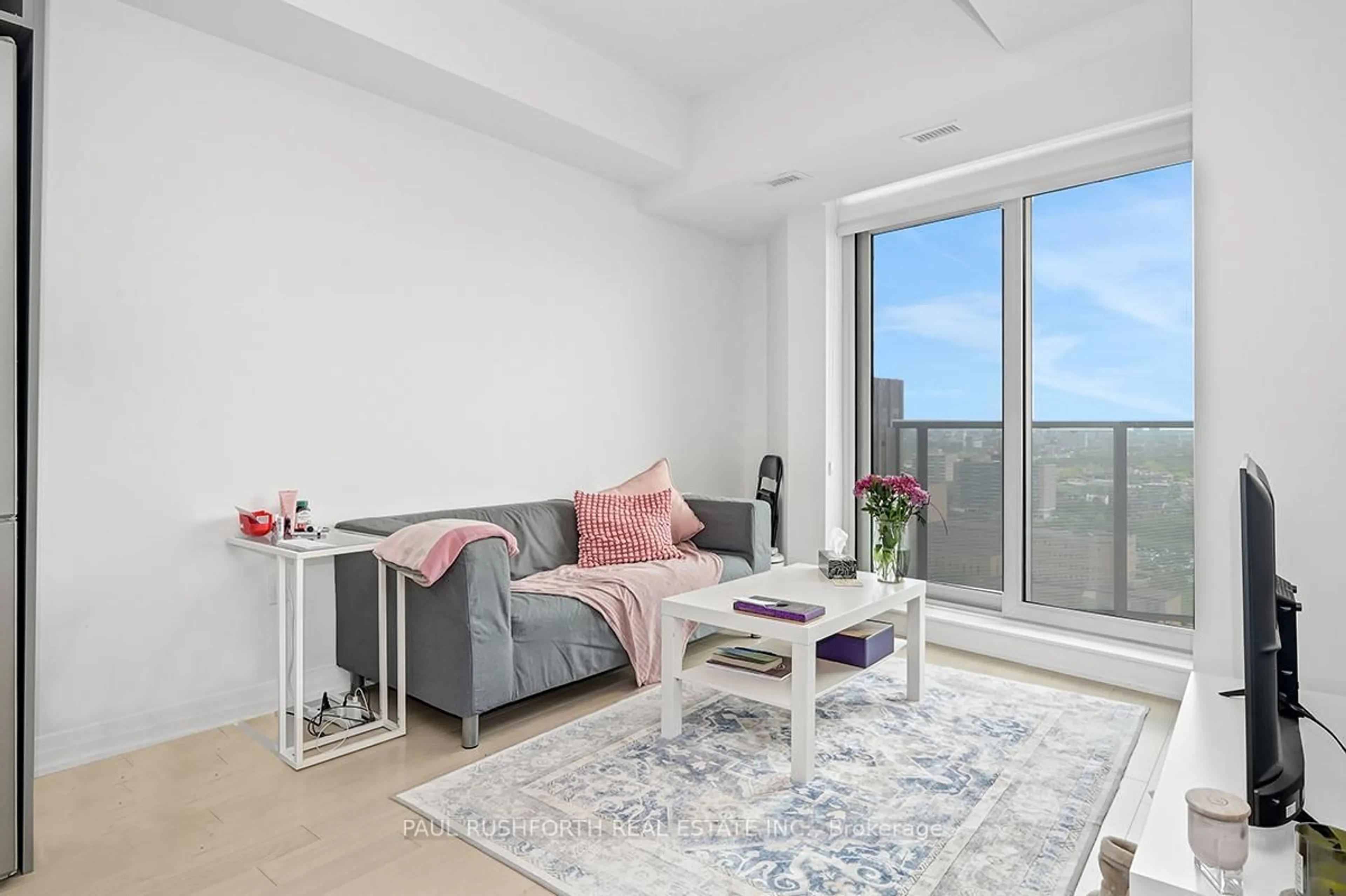 Living room with furniture, unknown for 805 Carling Ave #2108, Ottawa Ontario K1S 5W9