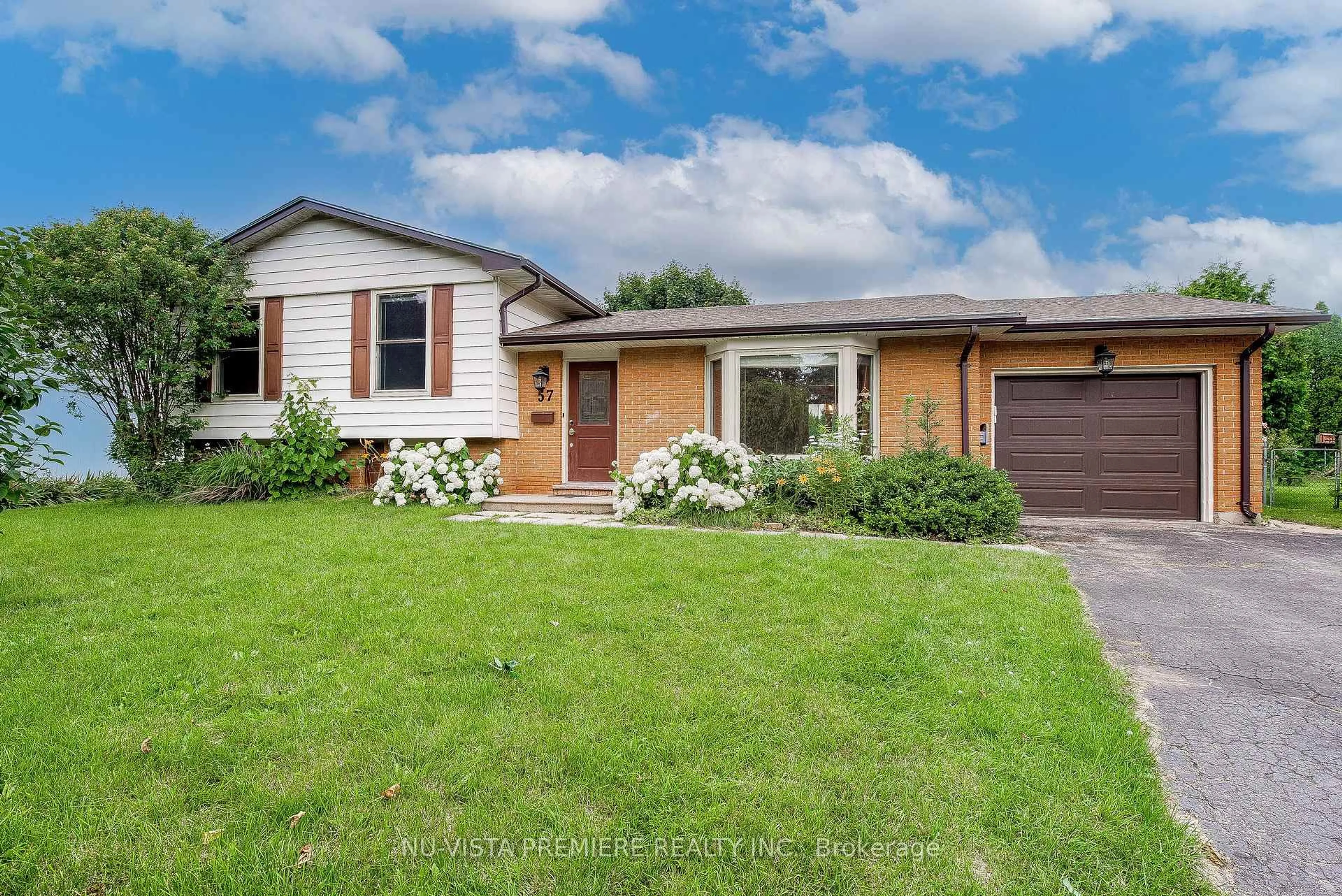 Home with vinyl exterior material, street for 57 McTaggart Cres, London North Ontario N5X 2E2