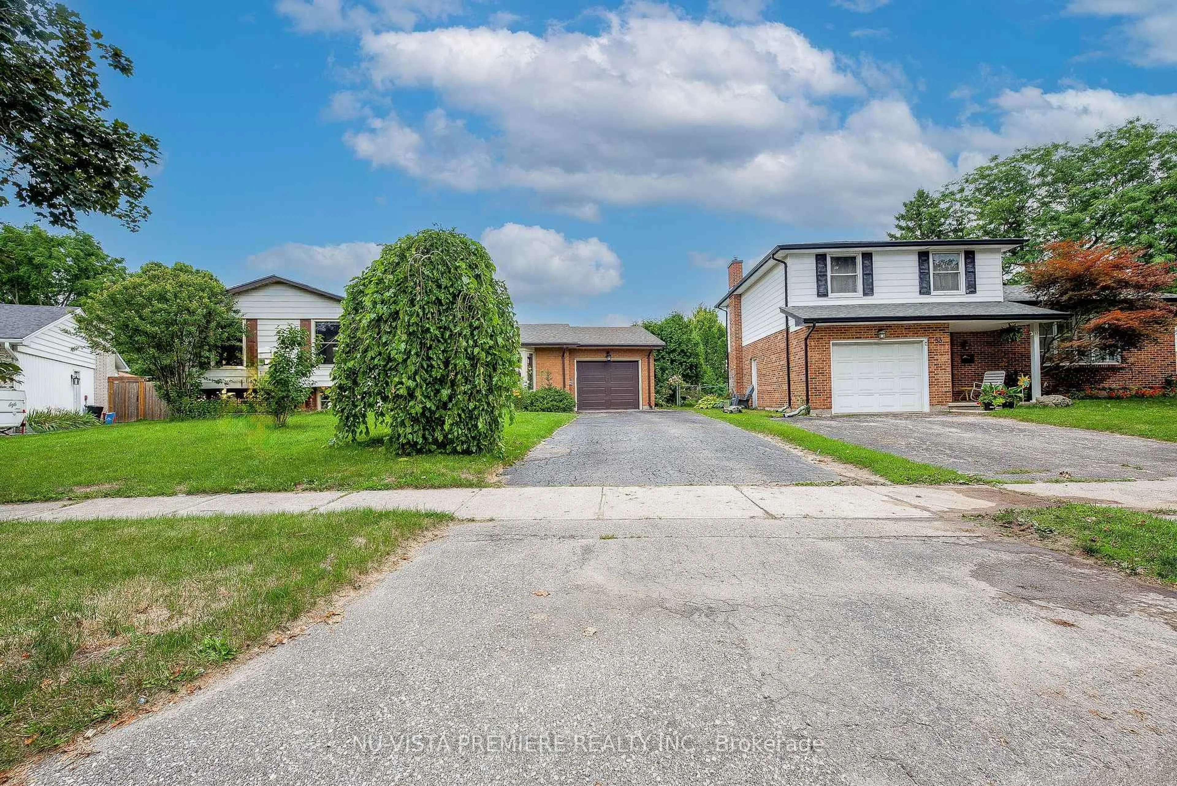 A pic from outside/outdoor area/front of a property/back of a property/a pic from drone, street for 57 McTaggart Cres, London North Ontario N5X 2E2