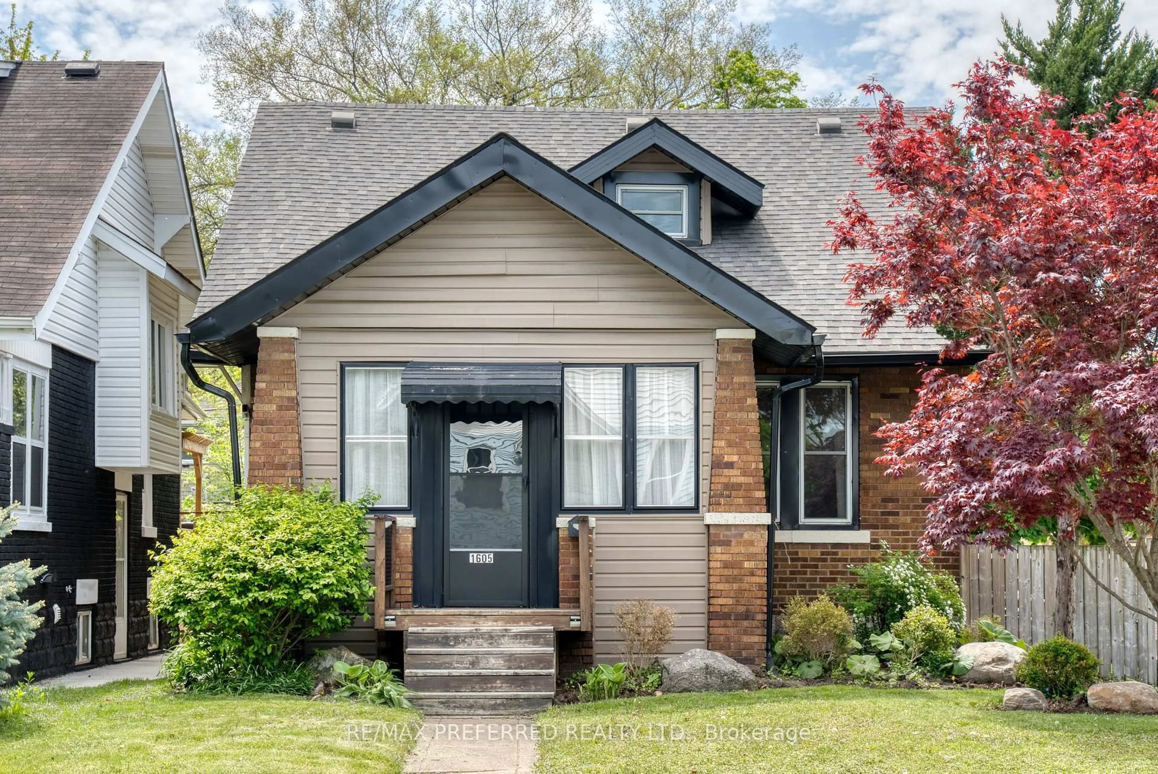 Home with brick exterior material, street for 1605 Dougall Ave, Windsor Ontario N8X 1S4