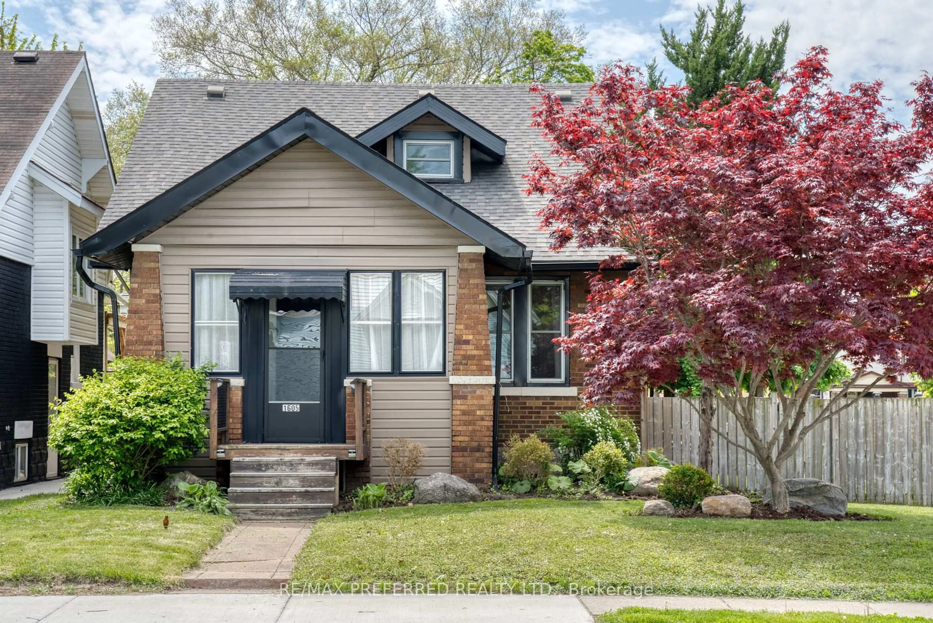 Home with brick exterior material, street for 1605 Dougall Ave, Windsor Ontario N8X 1S4