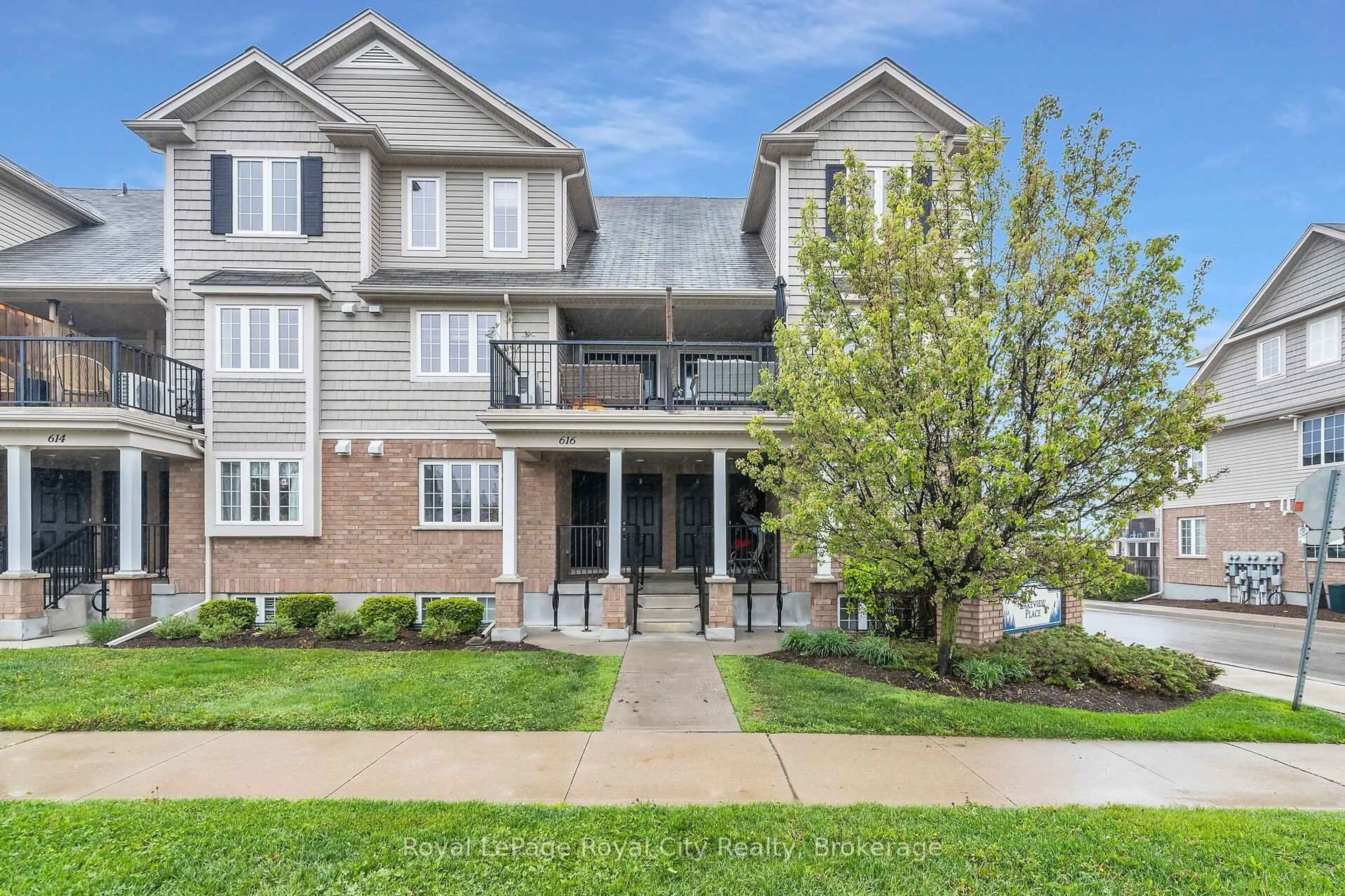 Home with brick exterior material, street for 616 Woodlawn Rd #A, Guelph Ontario N1E 0K4