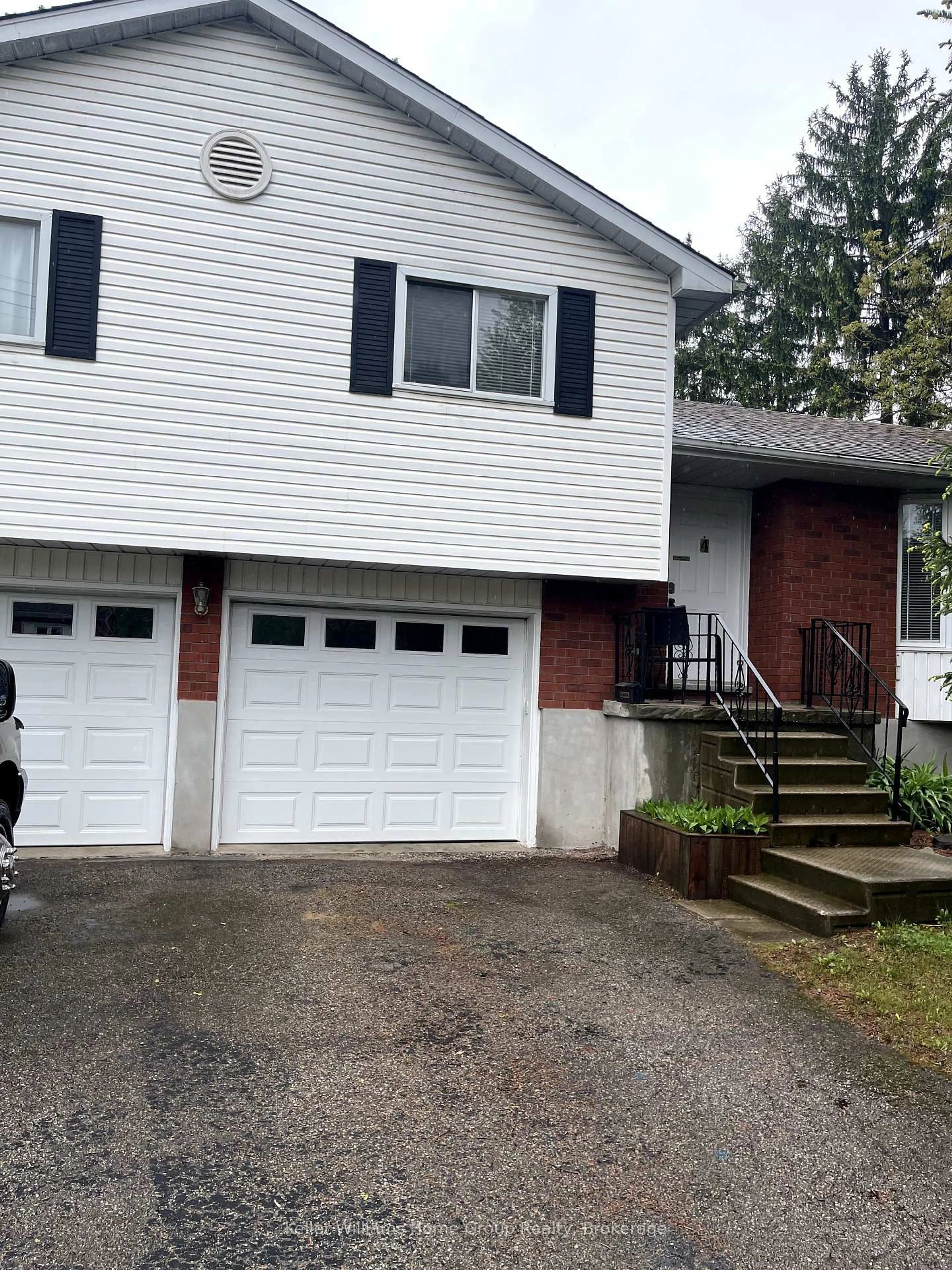 Home with vinyl exterior material, street for 4 Market St, Kitchener Ontario N2K 1H2