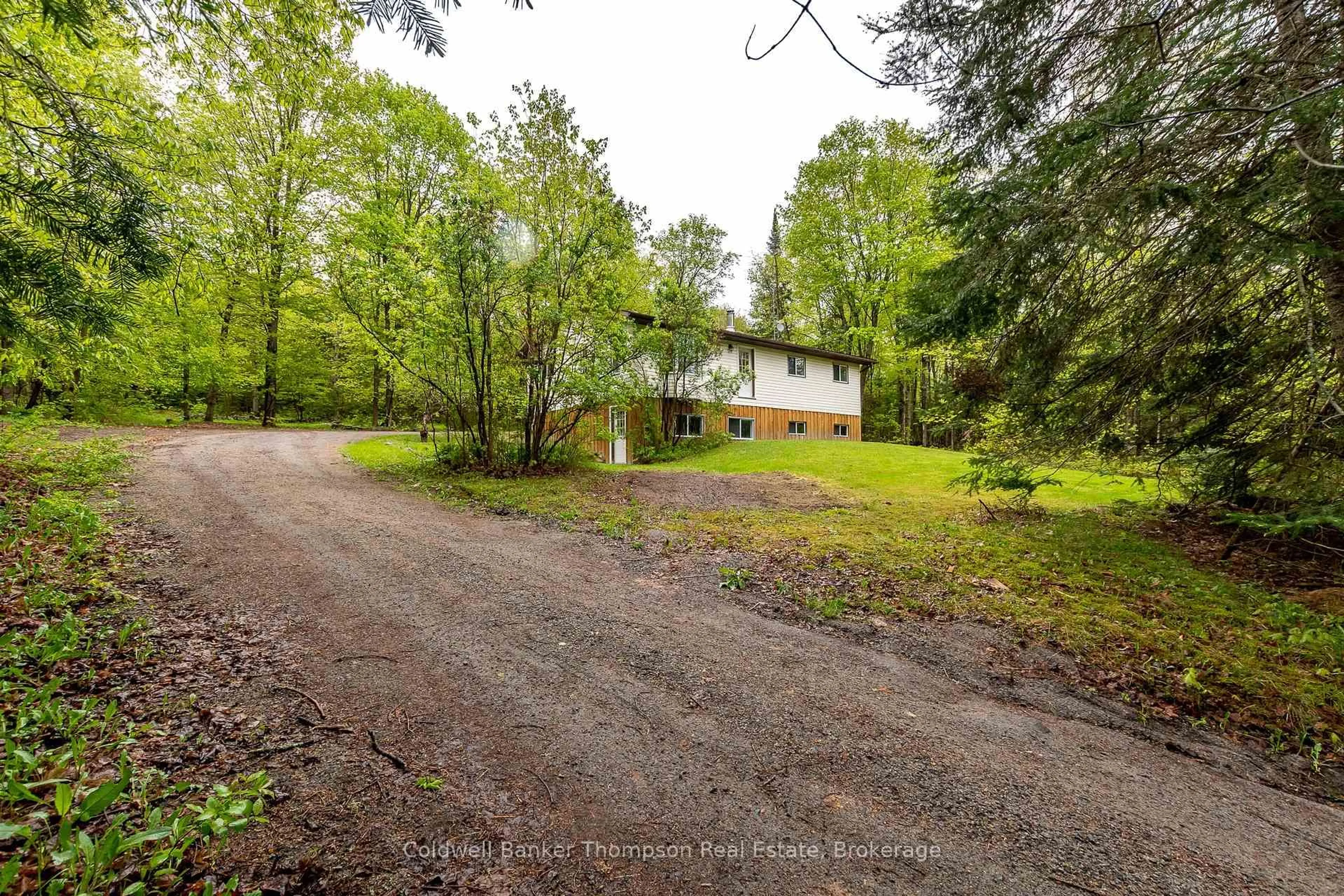 A pic from outside/outdoor area/front of a property/back of a property/a pic from drone, forest/trees view for 830 Deer Lake Rd, Perry Ontario P0A 1J0