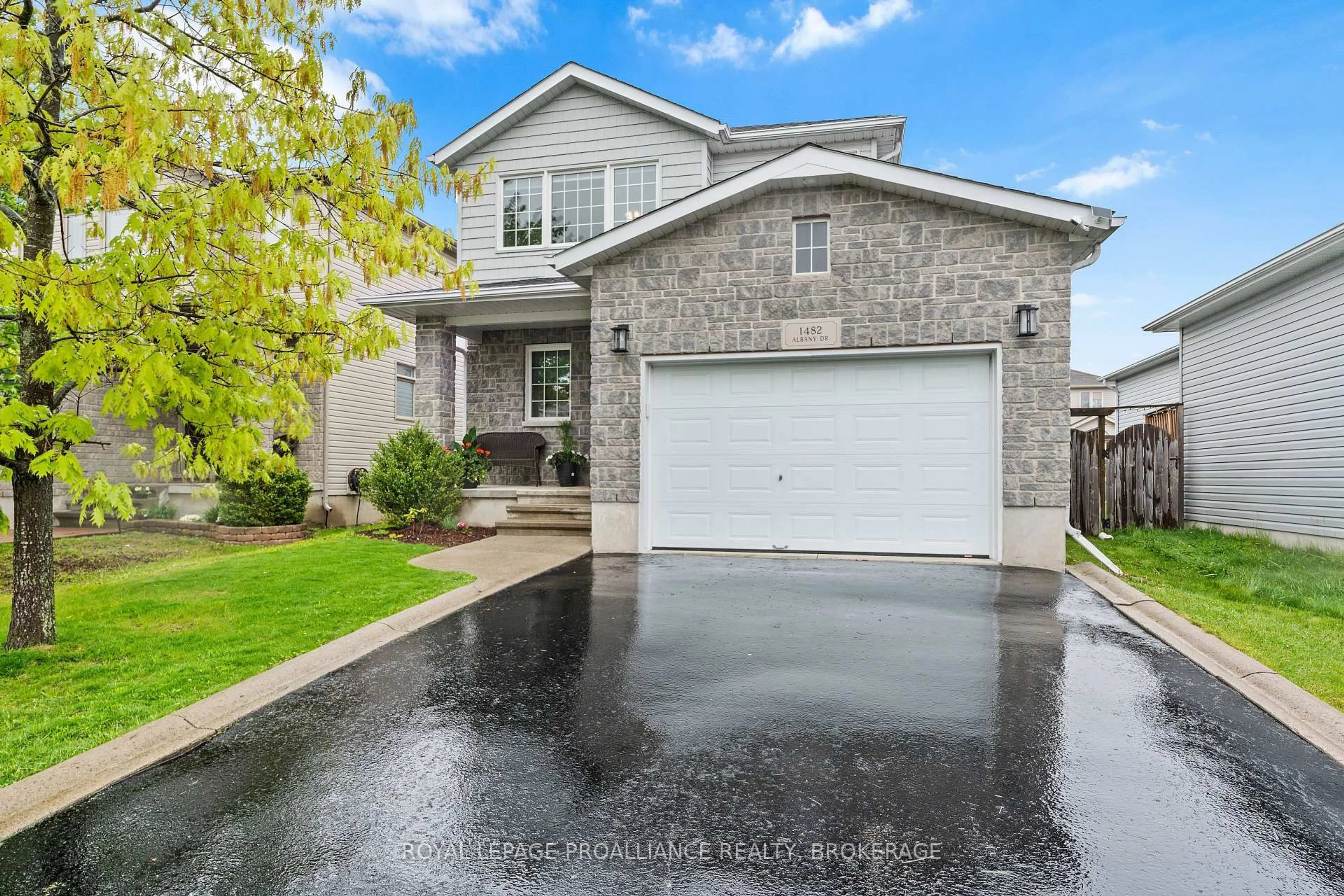 Home with vinyl exterior material, street for 1482 Albany Dr, Kingston Ontario K7P 0B8