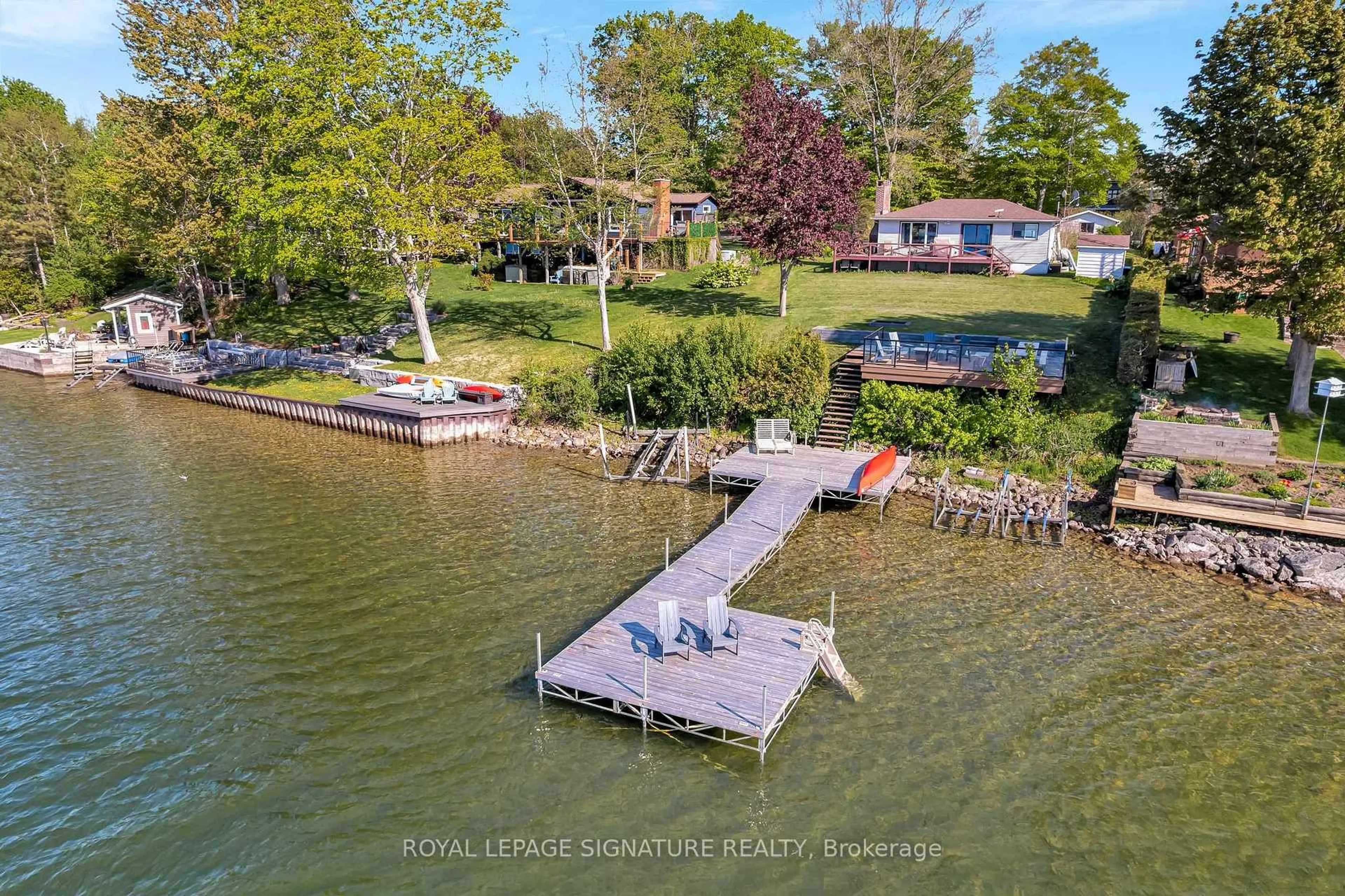 A pic from outside/outdoor area/front of a property/back of a property/a pic from drone, water/lake/river/ocean view for 318 Island Rd, Prince Edward County Ontario K0K 2T0