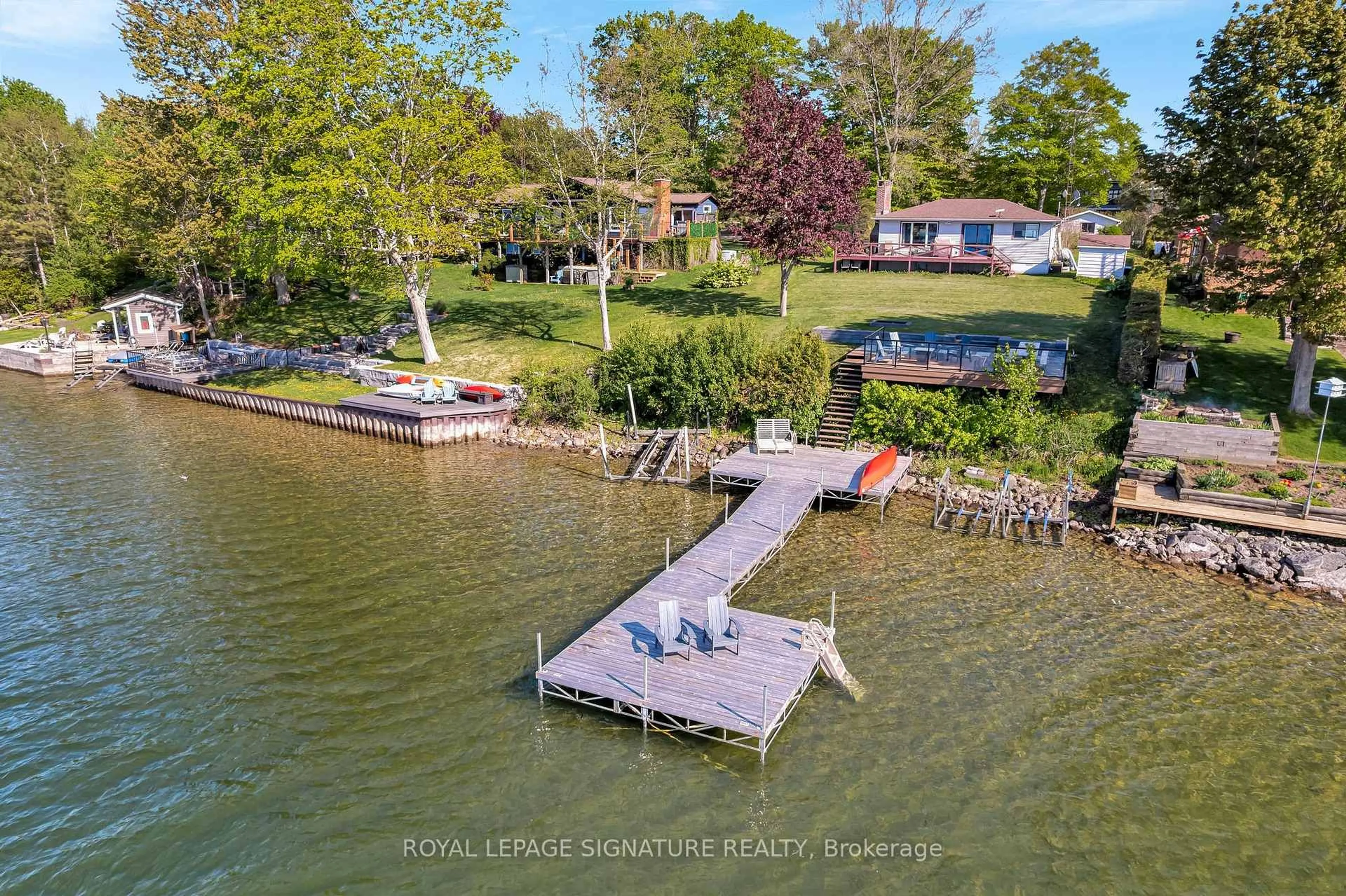 A pic from outside/outdoor area/front of a property/back of a property/a pic from drone, water/lake/river/ocean view for 318 Island Rd, Prince Edward County Ontario K0K 2T0