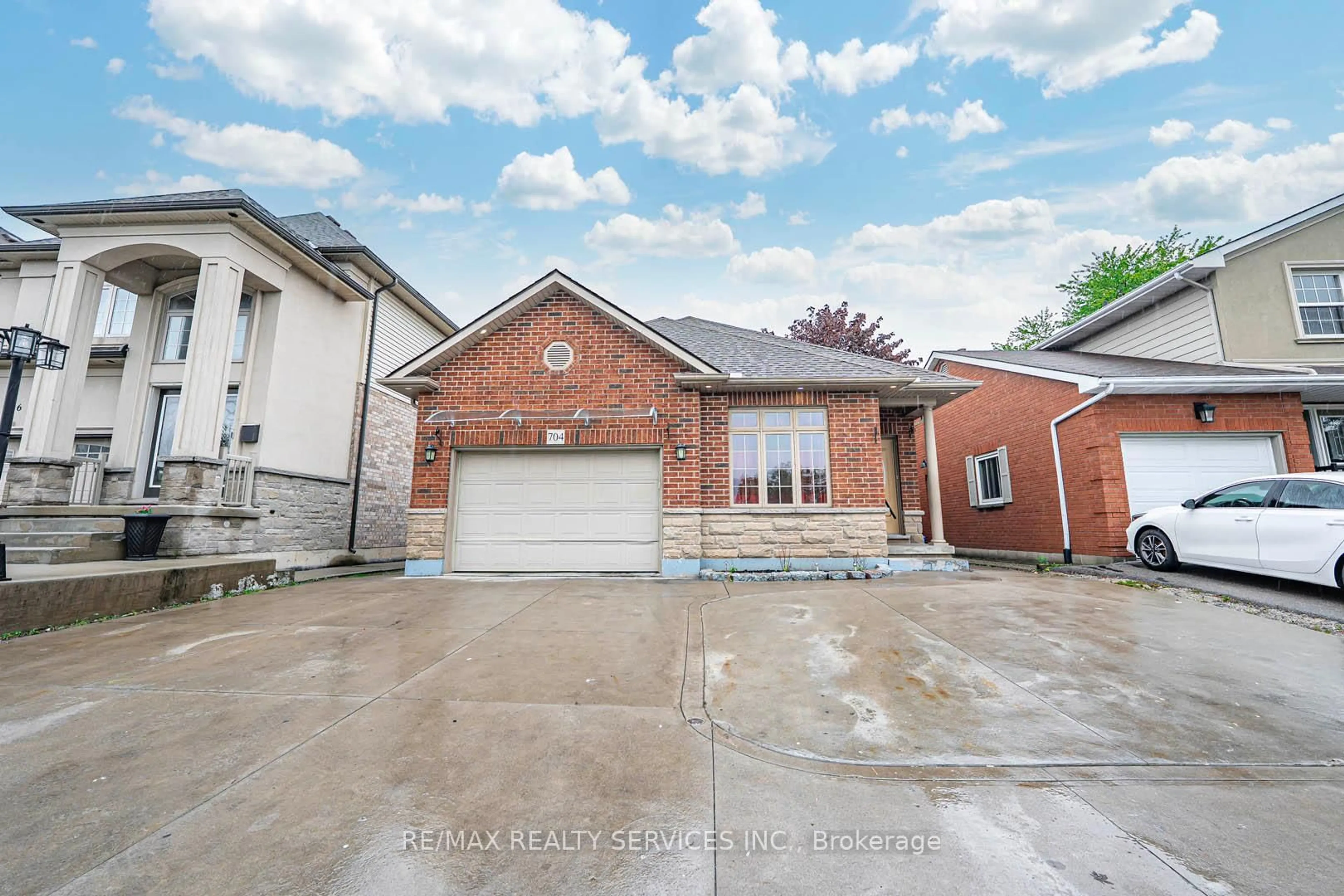 Home with brick exterior material, street for 704 Stone Church Rd, Hamilton Ontario L8W 1A7