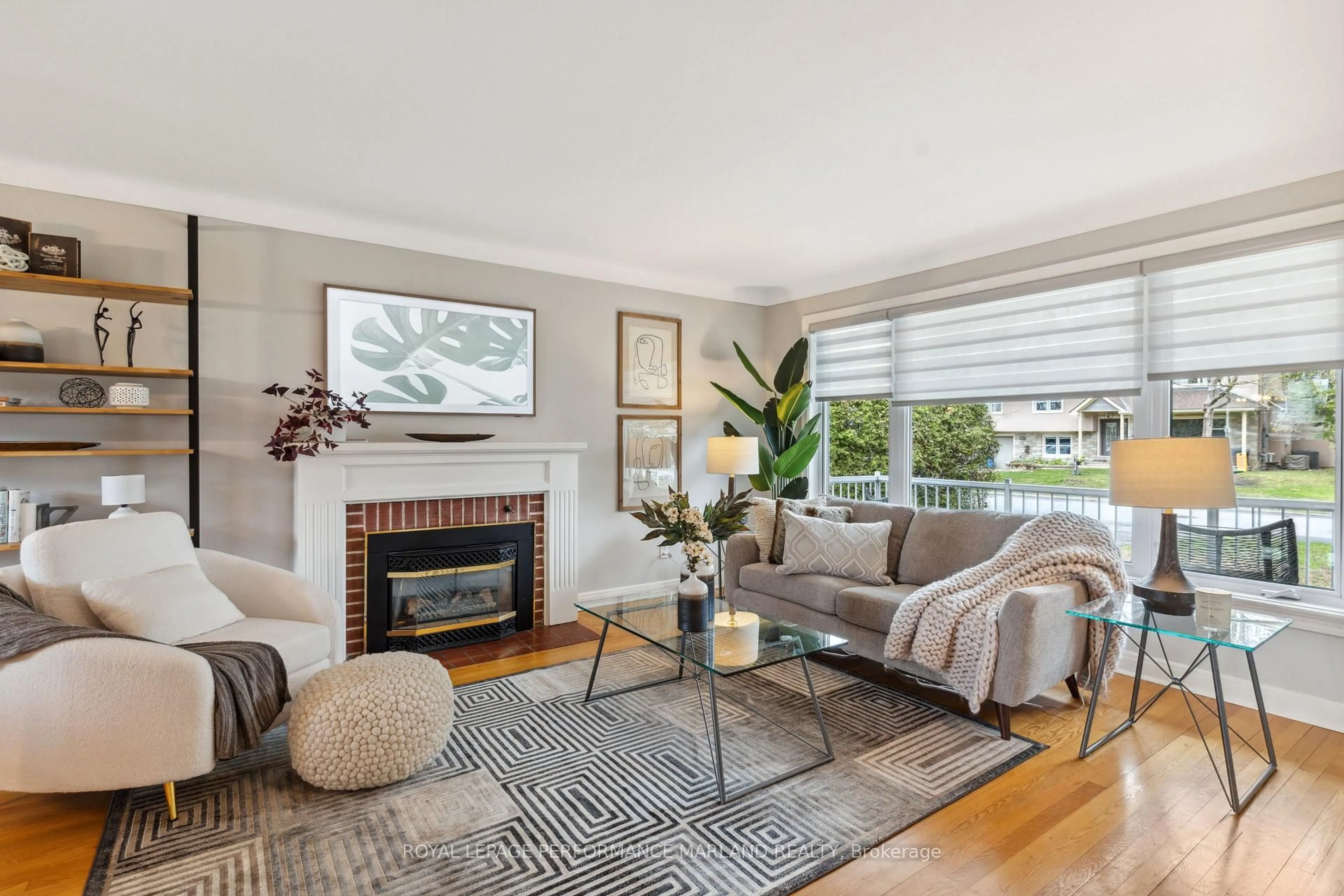 Living room with furniture, wood/laminate floor for 2075 Woodcrest Rd, Ottawa Ontario K1H 6H9