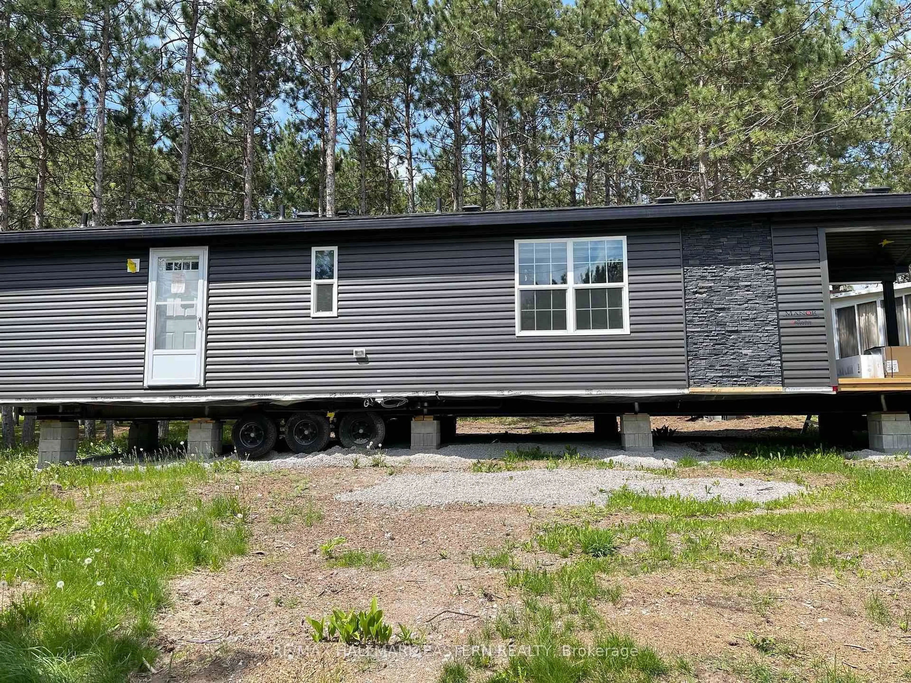 Home with vinyl exterior material, unknown for 52 Fire Route 39, Lot 206 N/A, Trent Lakes Ontario K0L 1J0